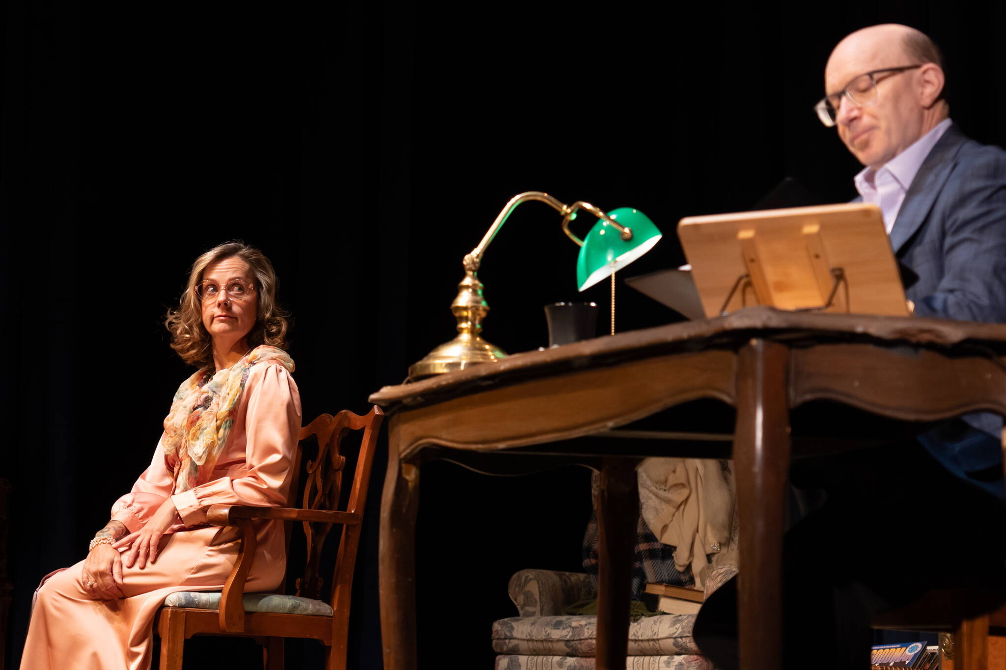 Elizabeth Pisel-Davis and Roblin Davis rehearse Thursday evening for “Love Letters” at McPhetres Hall. The play staged by Juneau Ghost Light Theatre debuts Friday. (Photo by Max Rosen)