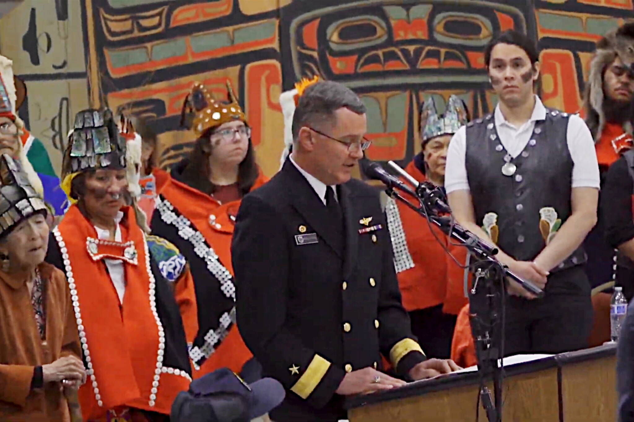 Rear Adm. Mark Sucato reads the U.S. Navy’s apology to the people of Angoon on Saturday, Oct. 26, 2024 commemorating 142 years to the day since the military bombarded the village in 1882. (Screen image from Sealaska Heritage Institute)