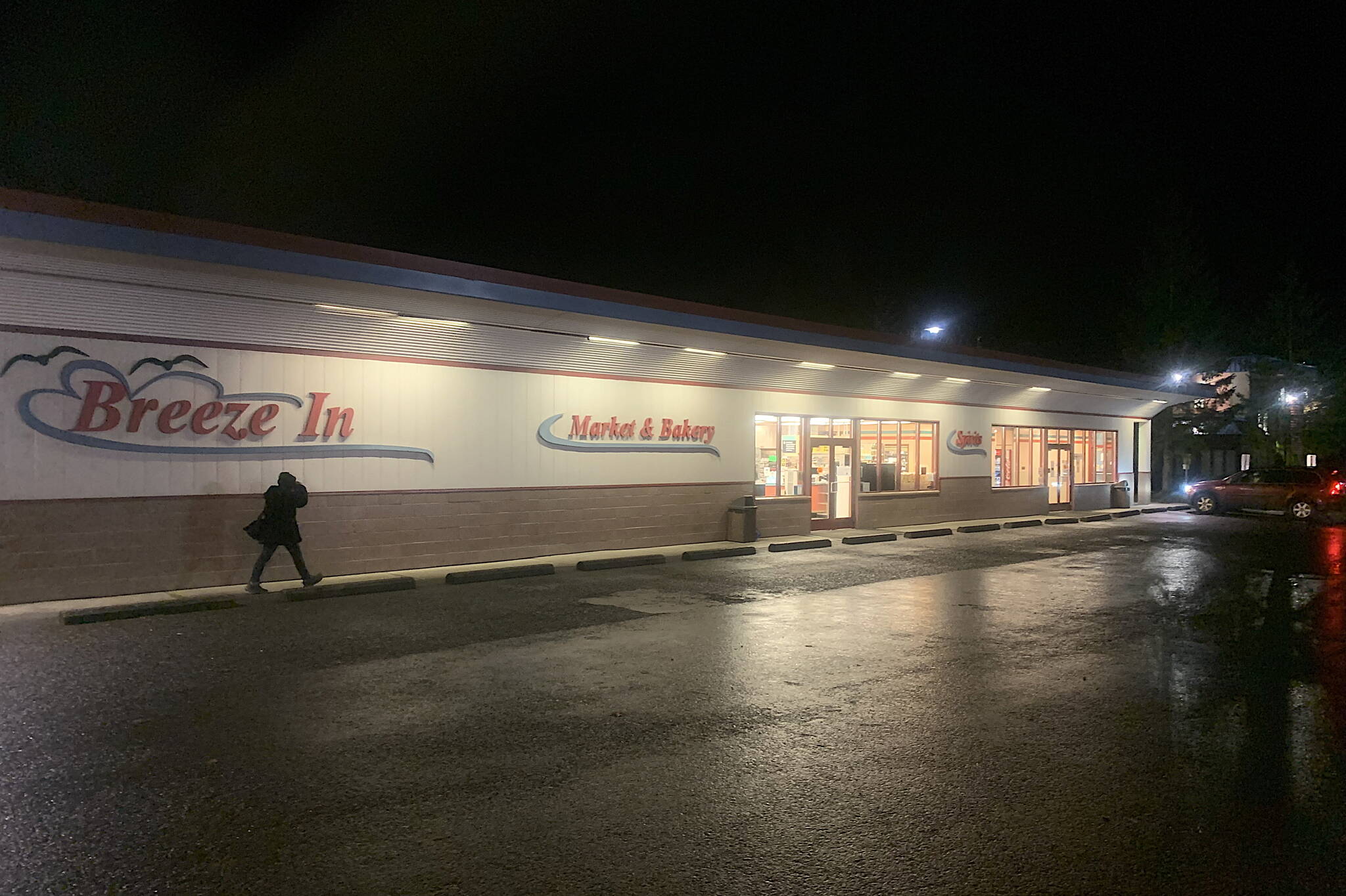 A customer approaches the entrance of the Breeze In in the Mendenhall Valley on Monday night. (Mark Sabbatini / Juneau Empire)