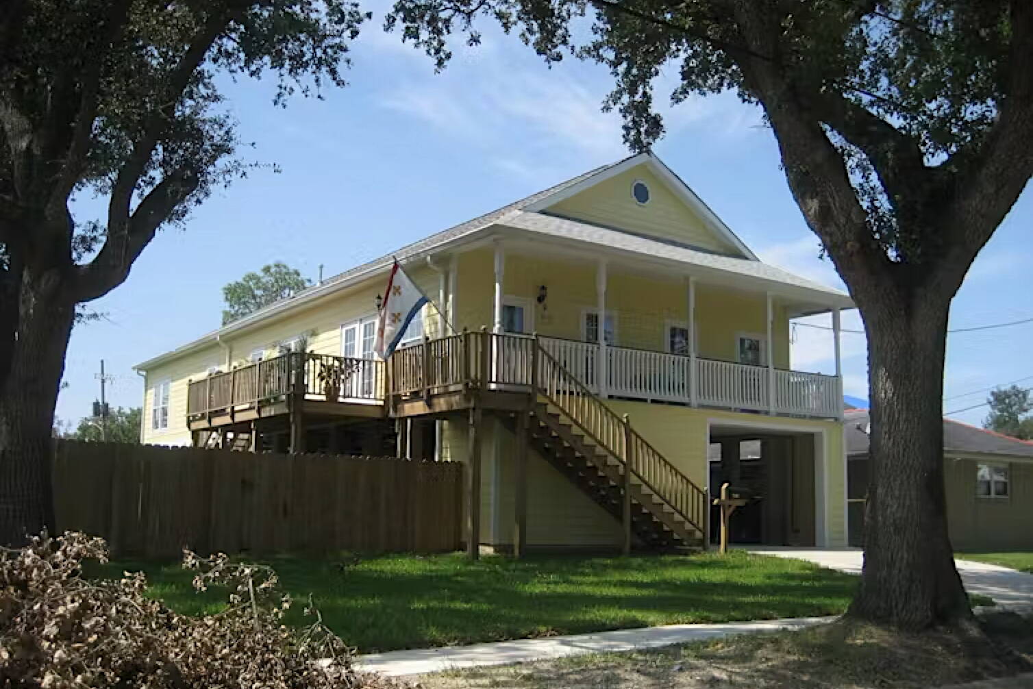 After Hurricane Katrina in 2005, many Louisiana homes were rebuilt with the living space on the second story, with garage space below, to try to protect the home from future flooding. (Infrogmation of New Orleans via Wikimedia, CC BY-SA)