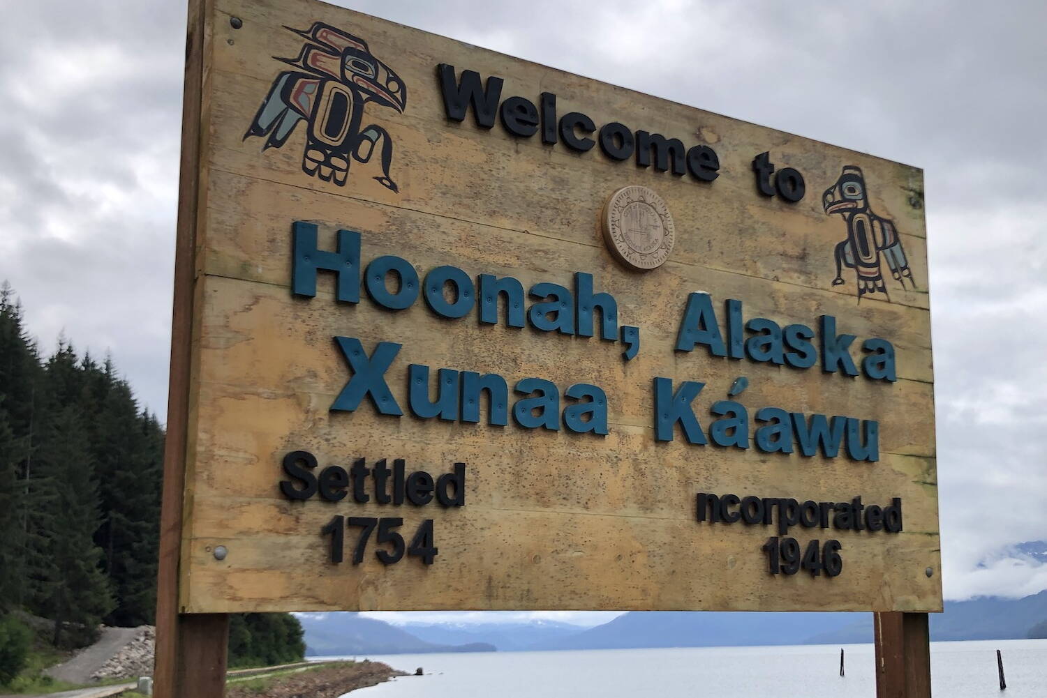 A sign welcomes visitors to Hoonah on Aug. 7, 2021 just outside the Icy Strait cruise ship port. (James Brooks/Alaska Beacon)