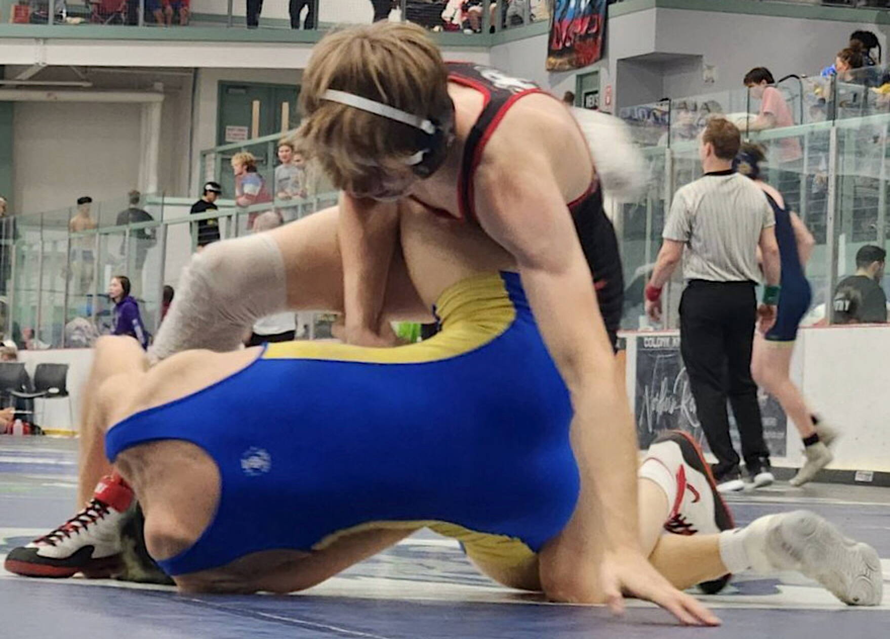 Juneau-Douglas High School: Yadaa.at Kalé 145-pound senior Owen Woodruff wrestles during last weekend’s Lancer Smith Memorial Wrestling Tournament at Wasilla’s Menard Sports Center. (JDHS courtesy photo)