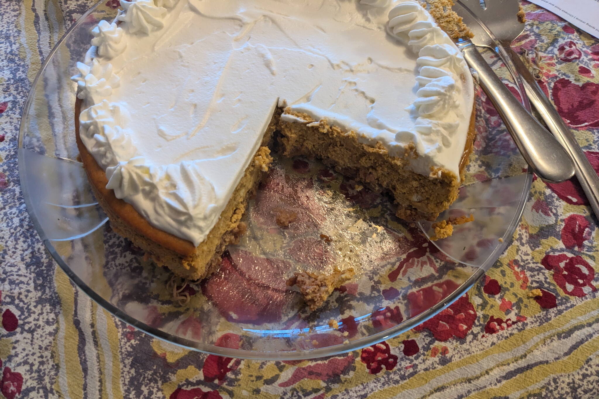 Pumpkin cheesecake with a pecan crust being served. (Photo by Patty Schied)