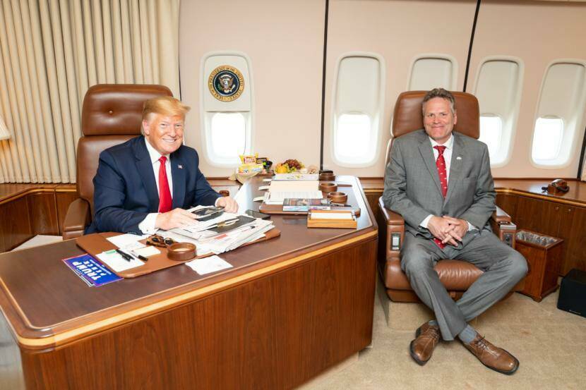 President Donald Trump and Alaska Gov. Mike Dunleavy pose for a photo aboard Air Force One during a stopover at Joint Base Elmendorf-Richardson in Anchorage in 2019. (Sheila Craighead / White House photo)