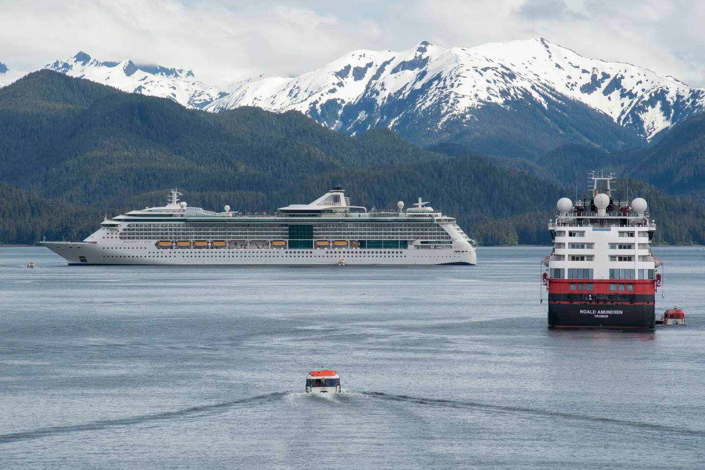 Lightering boats return to their ships in Eastern Channel in Sitka on June 7, 2022. (James Poulson/Sitka Sentinel)