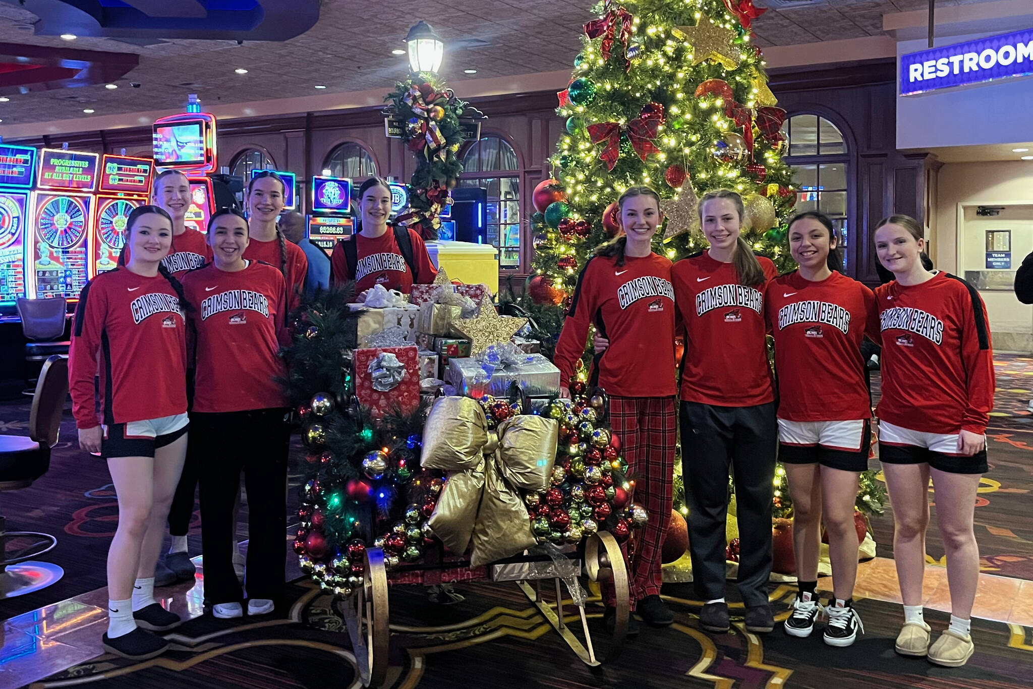 The Juneau-Douglas High School: Yadaa.at Kalé Crimson Bears girls basketball team pose at The Orleans Hotel upon their arrival in Las Vegas for the Tarkanian Classic Tournament. (Photo courtesy JDHS Crimson Bears)