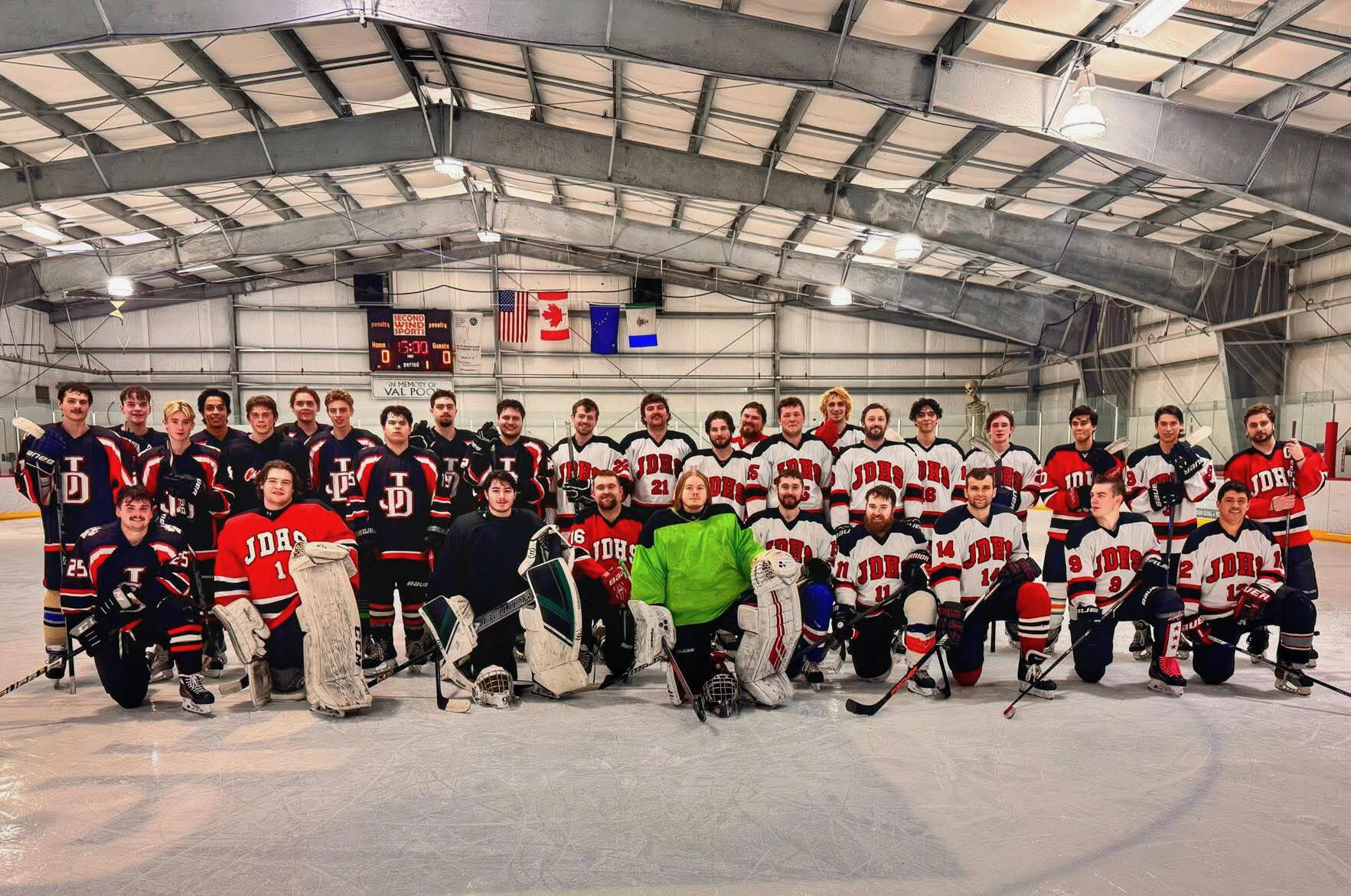 Juneau-Douglas High School: Yadaa.at Kalé alumni hockey players pose on the Treadwell Ice Arena sheet on Dec. 26. (Photo courtesy JDHS hockey)