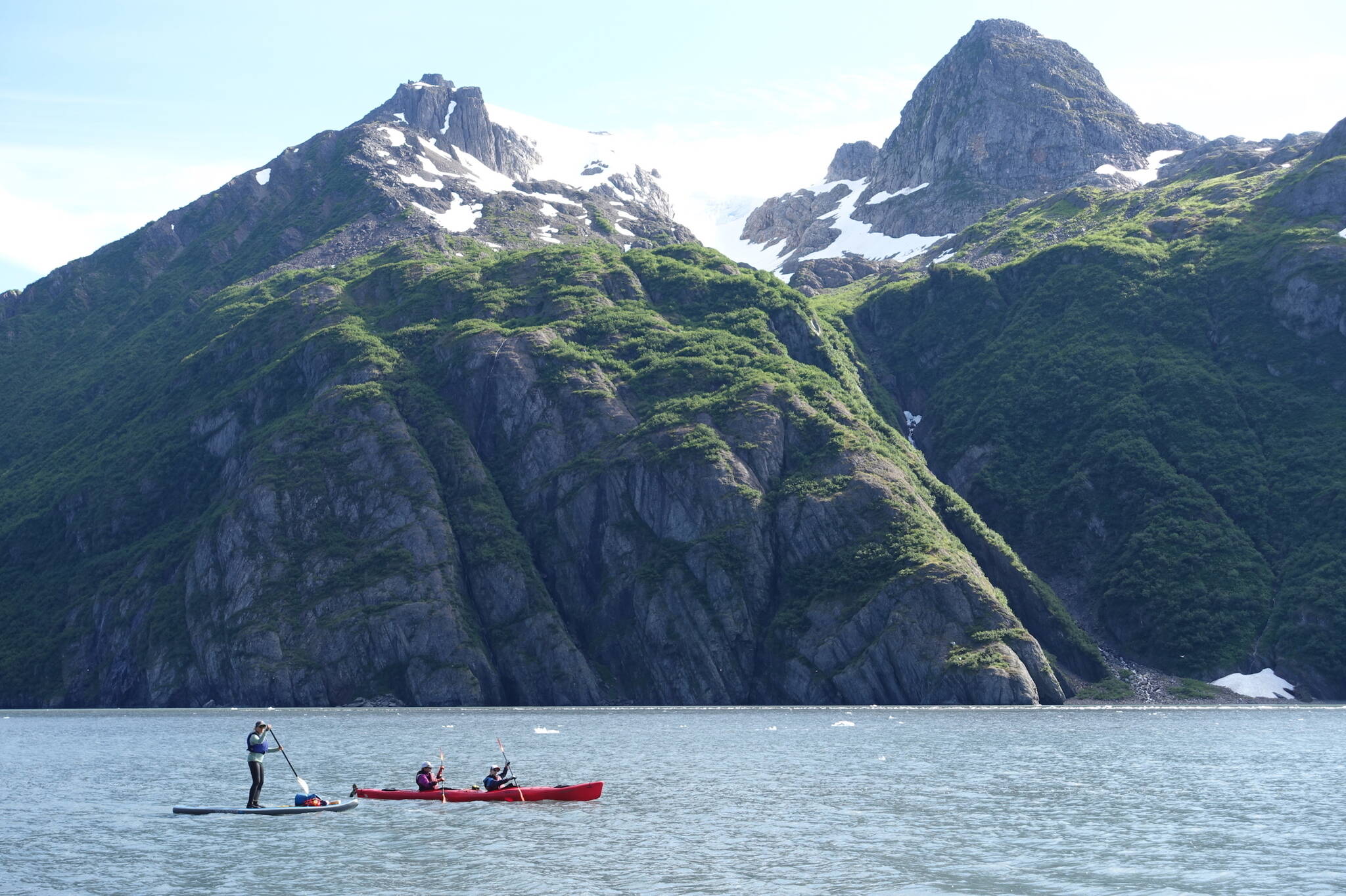 Boaters paddle Kenai Fjords National Park in summer 2024. The park was created in 1980 as part of the Alaska National Interest Lands Conservation Act. (Photo by Ned Rozell)