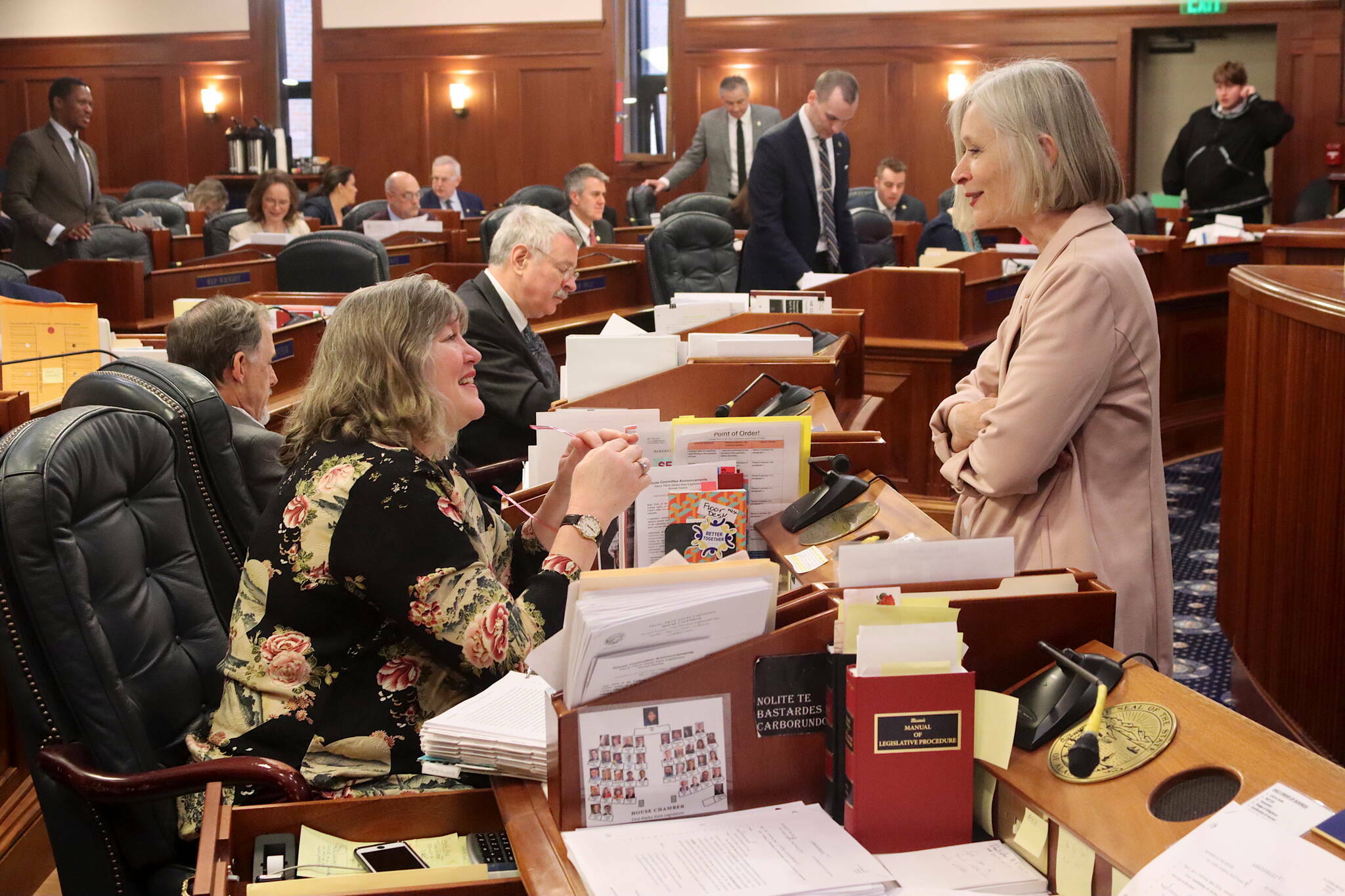 Rep. Sara Hannan (left) and Rep. Andi Story, both Juneau Democrats, talk during a break in floor debate Sunday, May 12, 2024, at the Alaska State Capitol. (Mark Sabbatini / Juneau Empire file photo)