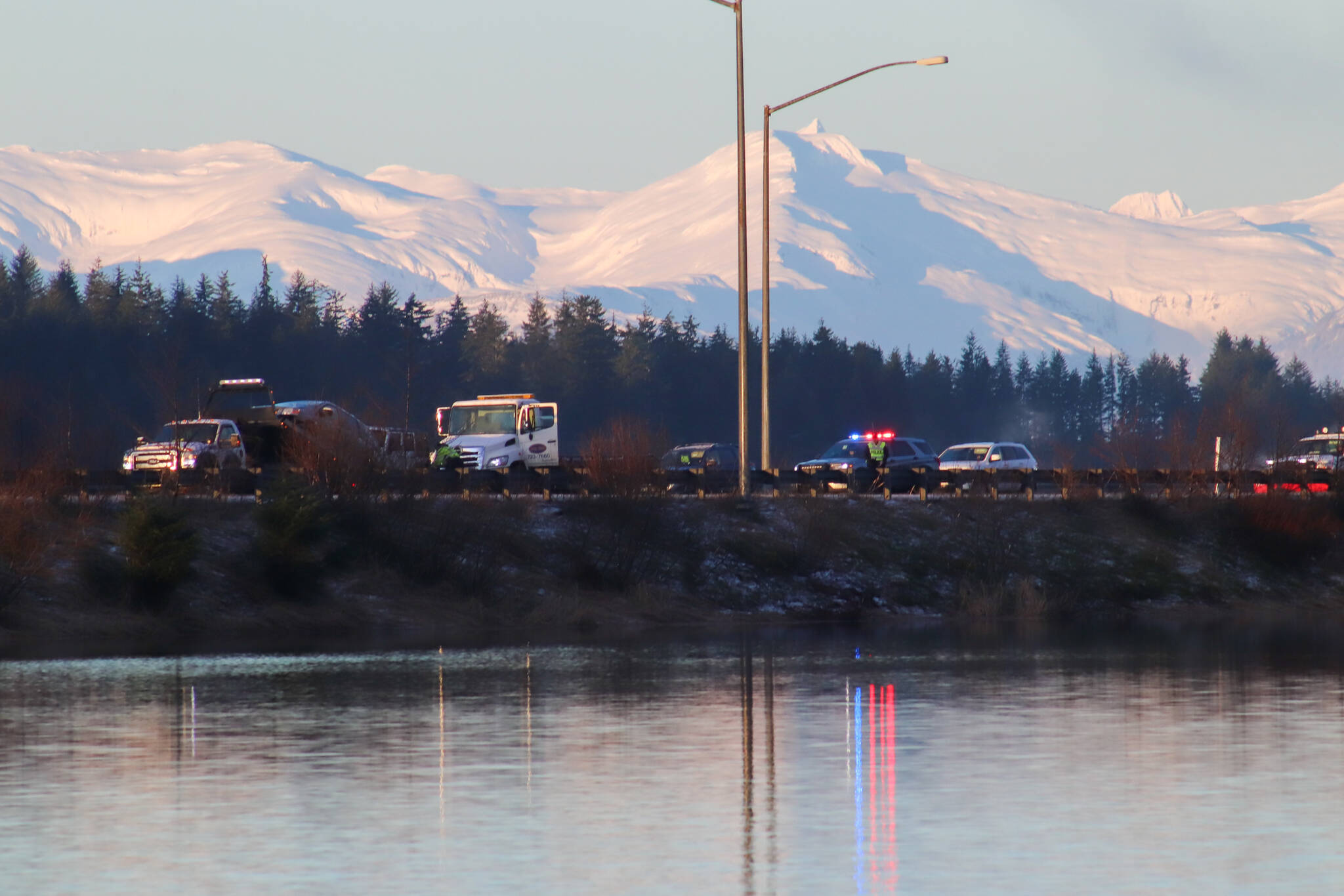 The Juneau Police Department and Capital City Fire/Rescue responds to a car accident on Egan Drive Thursday morning. (Jasz Garrett / Juneau Empire)