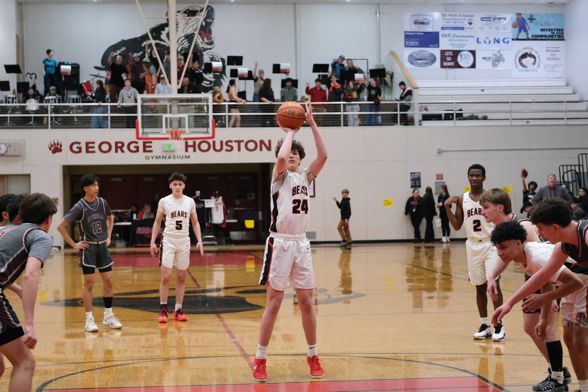 Juneau-Douglas High School: Yadaa.at Kalé sophomore Logan Carriker (24) scores on a free throw against Ketchikan earlier this season in the George Houston Gymnasium. Carriker was noted for his play at Colony on Thursday. (Klas Stolpe / Juneau Empire file photo)