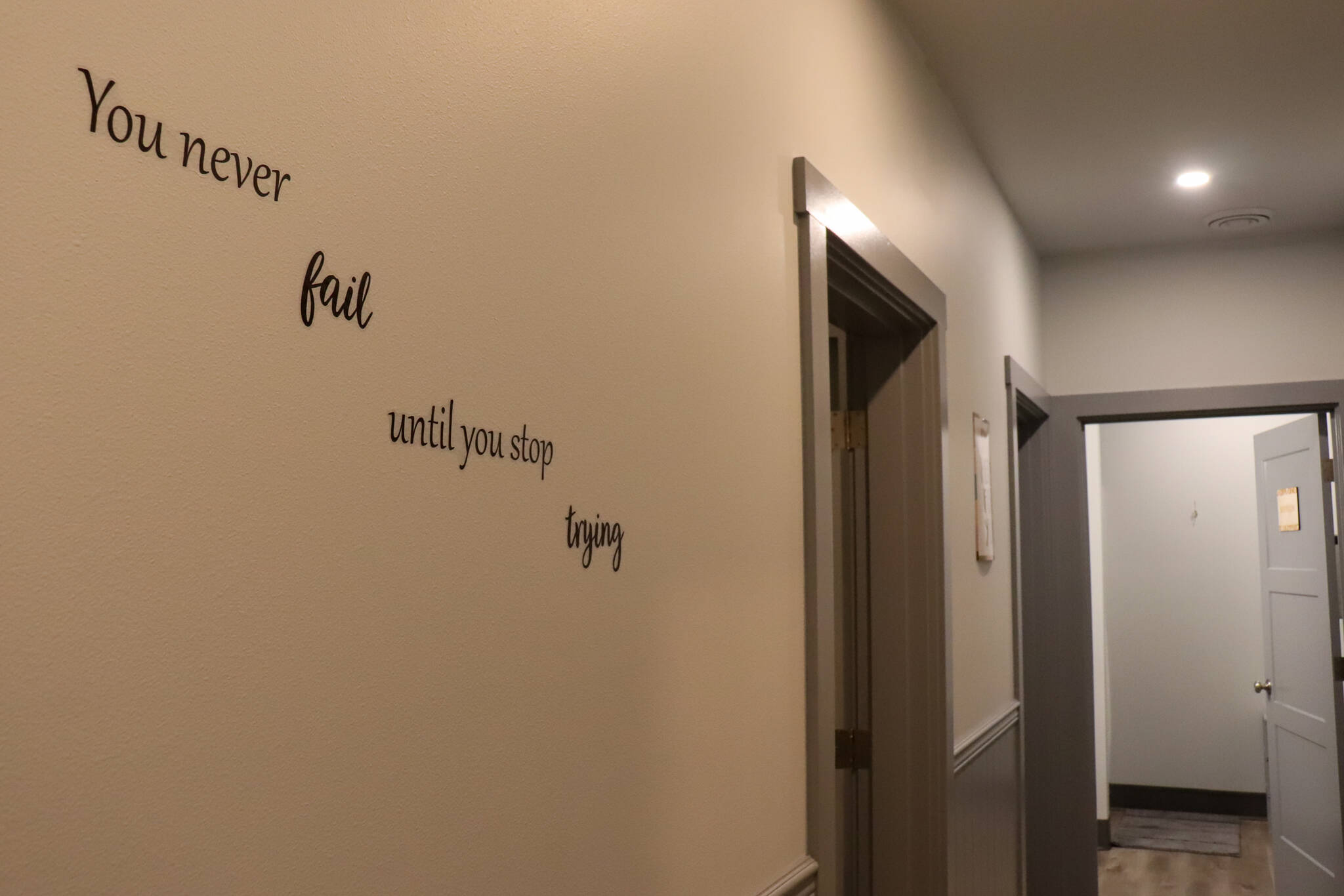 “You never fail until you stop trying” and other words of encouragement and support decorate the walls of Haven House. (Jasz Garrett / Juneau Empire)