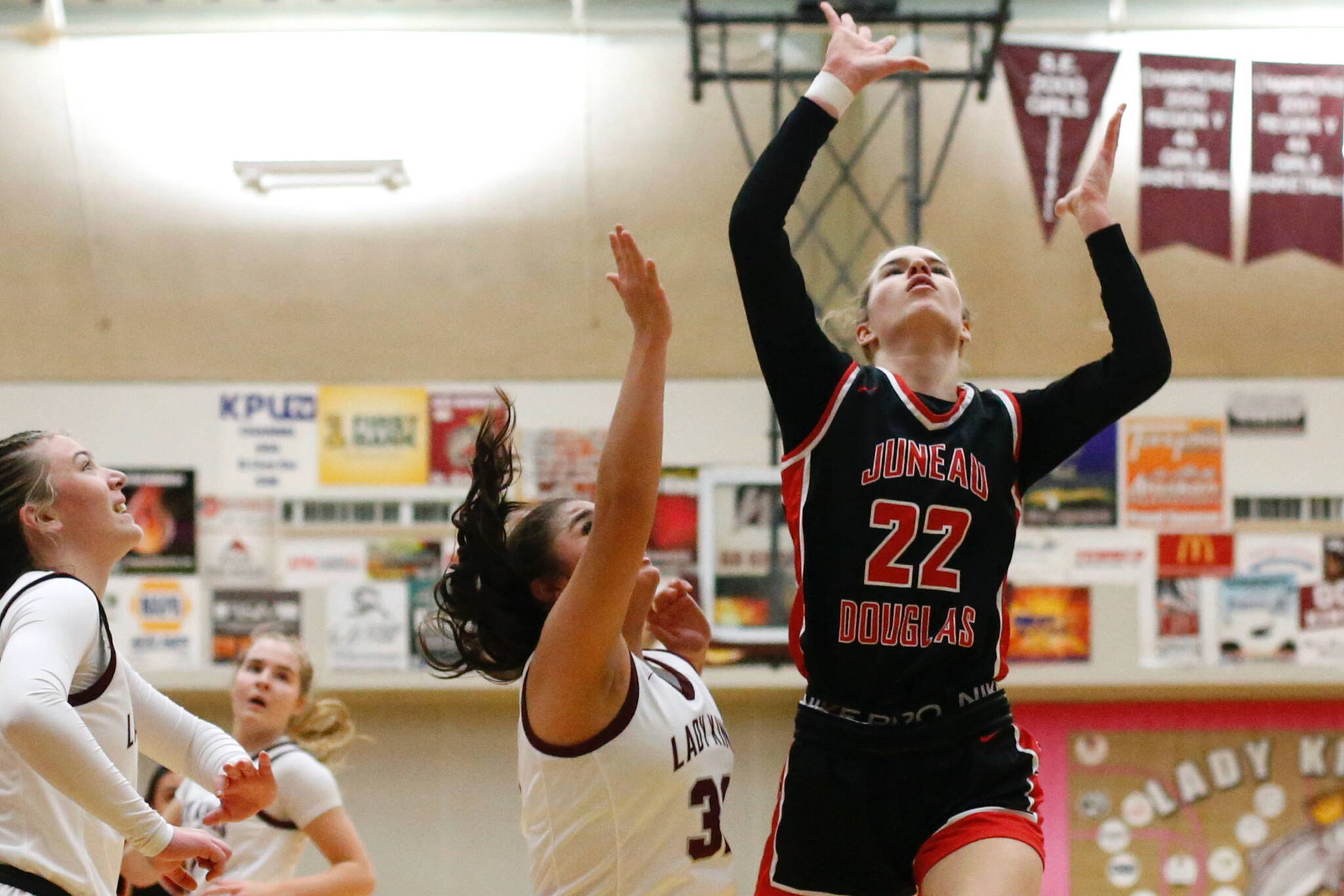 Juneau-Douglas High School: Yadaa.at Kalé’s Kerra Baxter shoots a layup during Juneau Douglas’s 58-27 win over Ketchikan at the Clarke Cochrane Gymnasium on Friday. (Christopher Mullen/ Ketchikan Daily News)