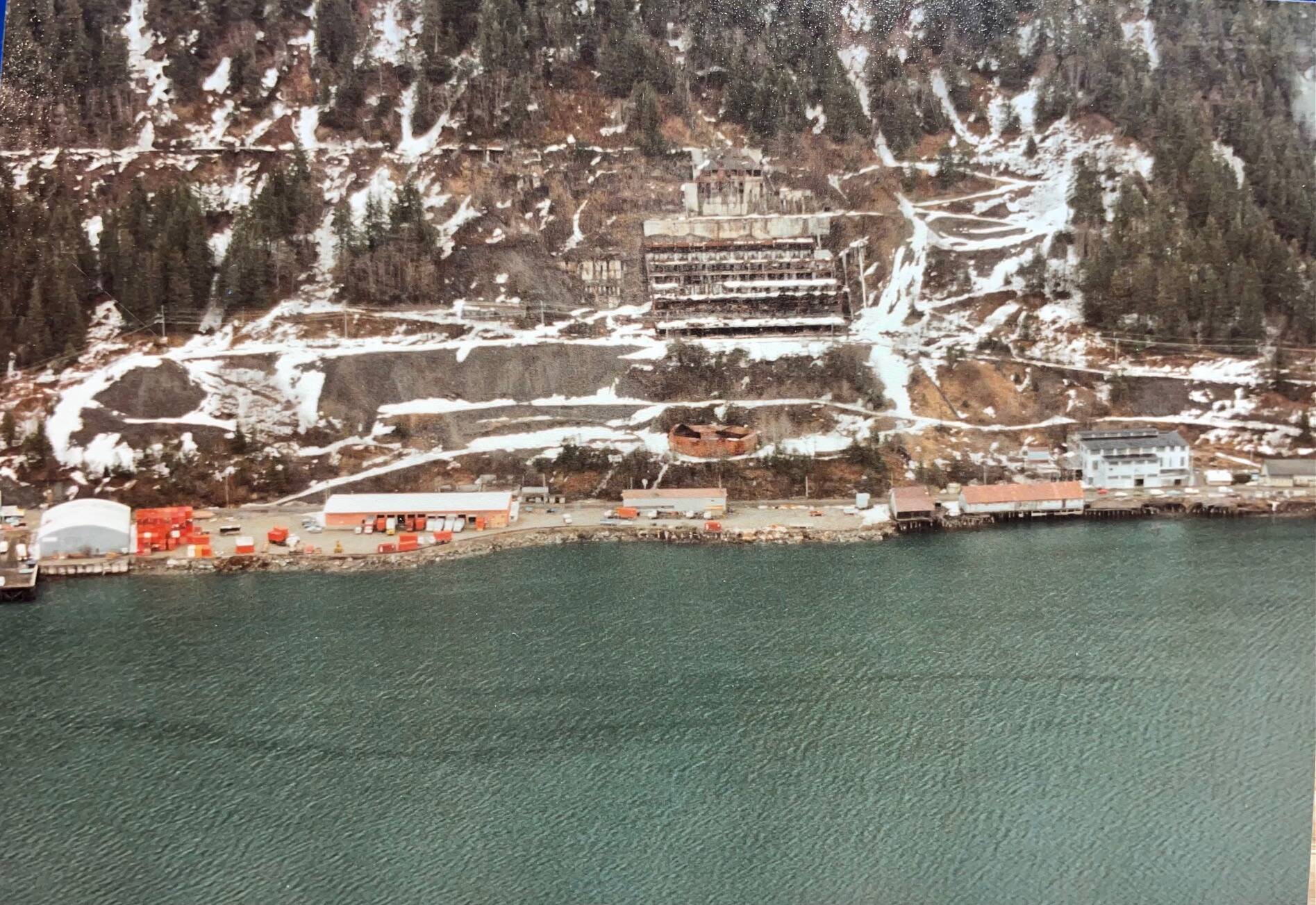 Snow illuminates several Alaska-Juneau Gold Mine mill site roadways in this 1980s photo. The steam plant is visible in the right foreground. (Laurie Craig / Juneau Empire)