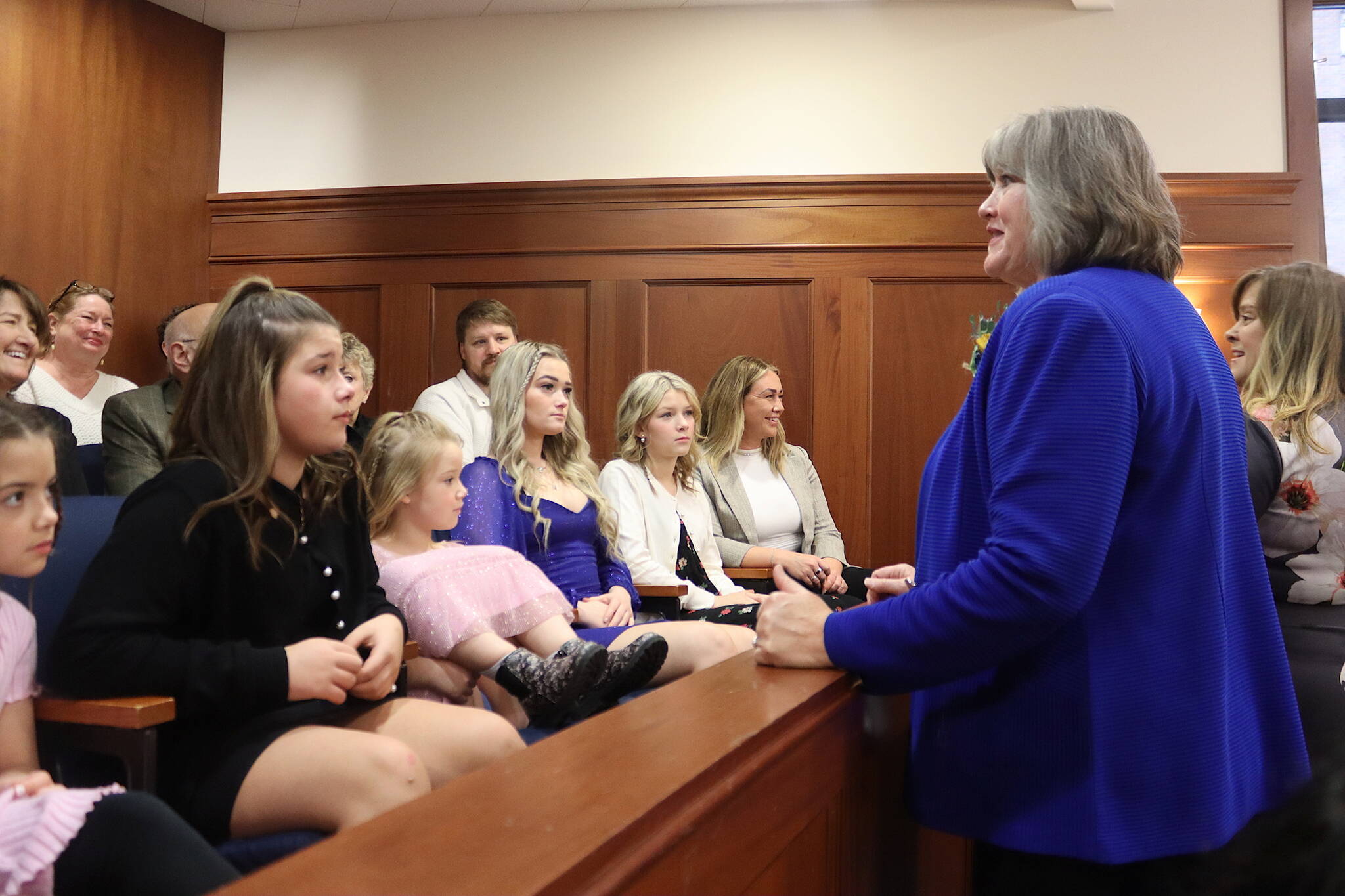 State Rep. Sara Hannan (D-Juneau) greets people in an audience gallery in the House Chambers during a break in the opening day of the 34th Alaska State Legislature on Tuesday at the Alaska State Capitol. (Mark Sabbatini / Juneau Empire)(Mark Sabbatini / Juneau Empire)