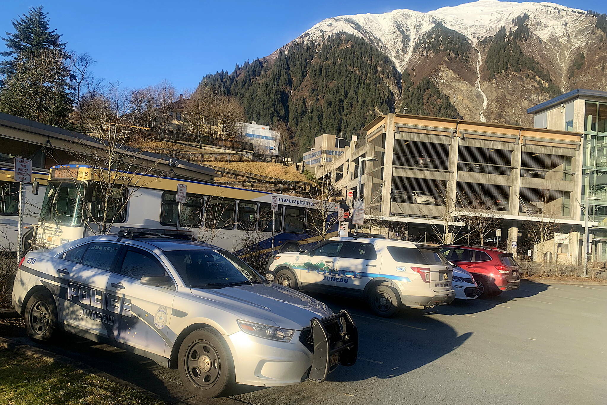 Juneau Police Department cars are parked outside the downtown branch station on Thursday, Nov. 21, 2024. (Mark Sabbatini / Juneau Empire file photo)