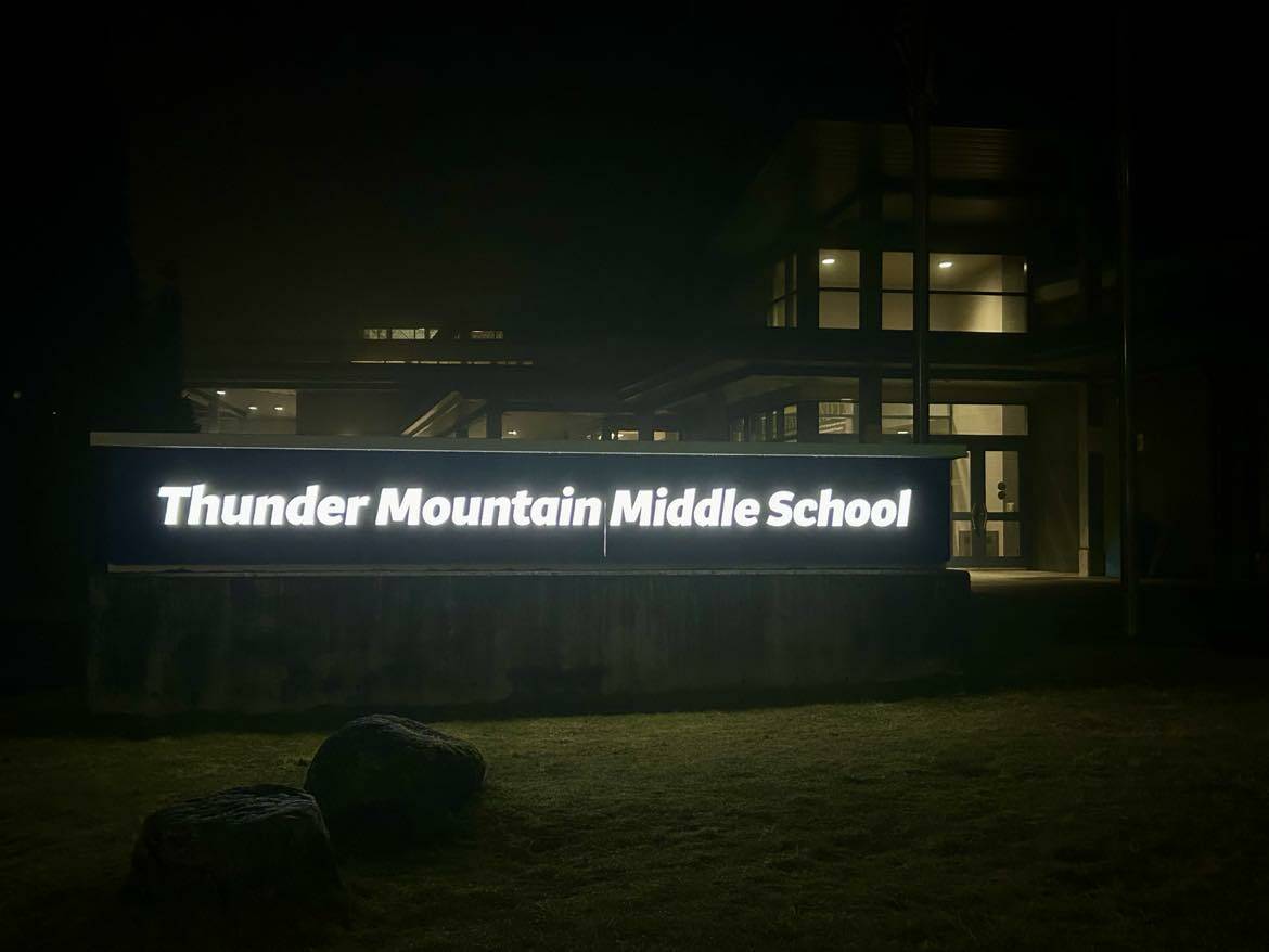 A sign at Thunder Mountain Middle School was changed in January 2025 from Thunder Mountain High School to reflect the Juneau School District consolidation that officially took effect July 1, 2024. (Jasz Garrett / Juneau Empire)