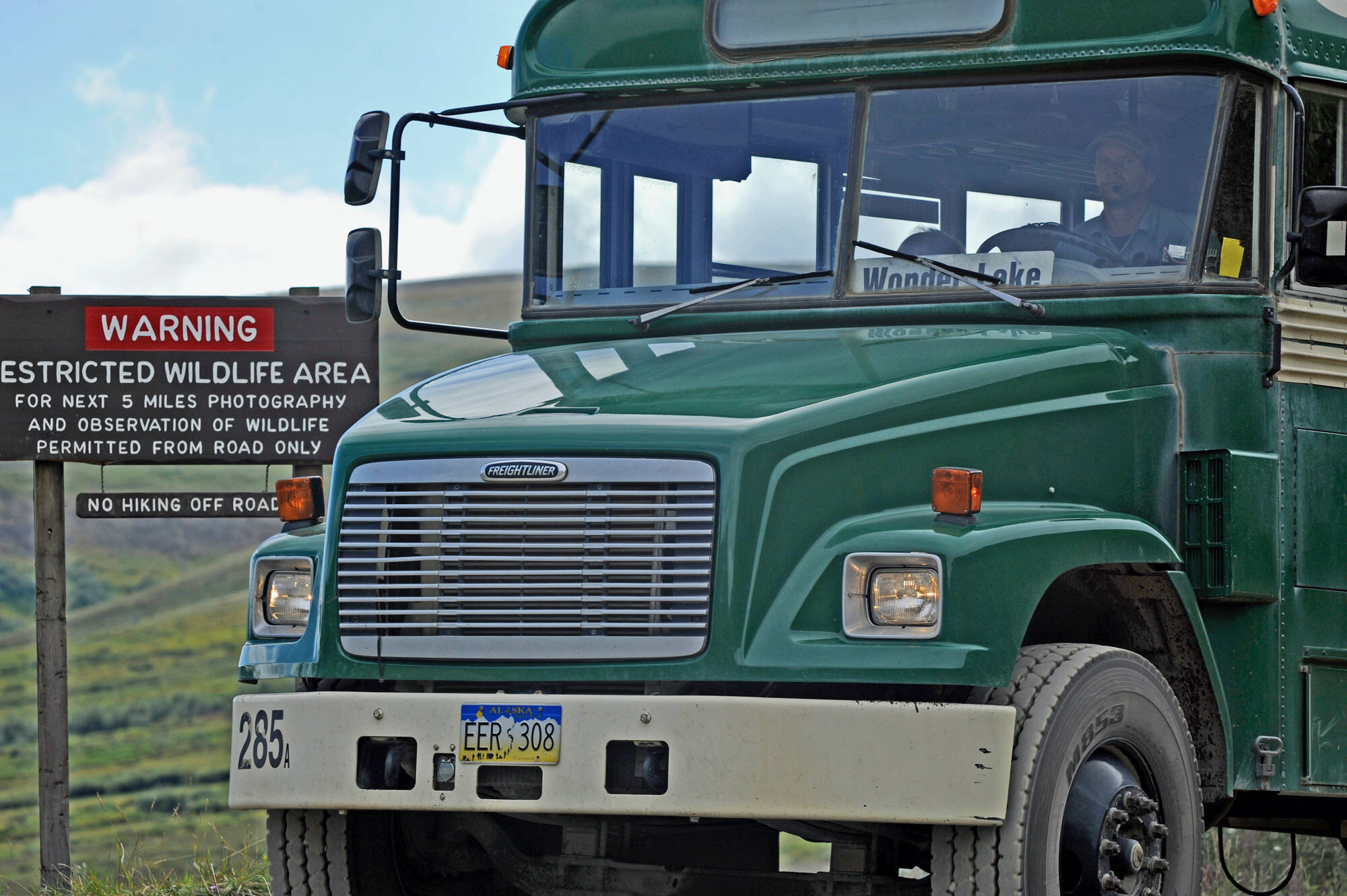 A sign in Denali National Park and Preserve warns visitors not to leave the road during a stretch between Polychrome Pass and Sable Pass. (Klas Stolpe)