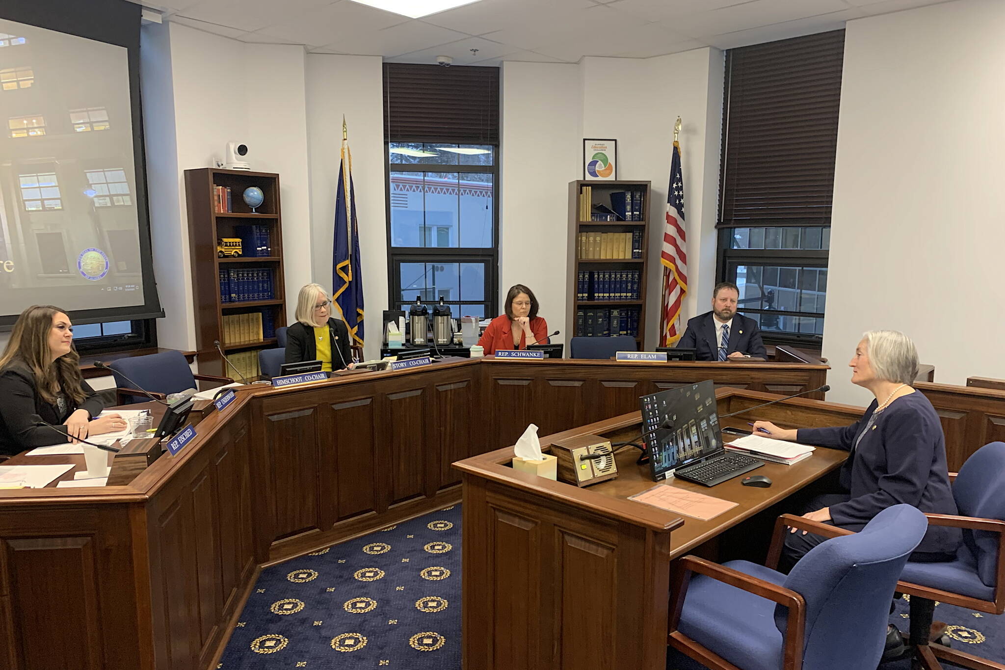 State Rep. Rebecca Himschoot (right), I-Sitka, answers a question from Rep. Jubilee Underwood (right), R-Wasilla, about a bill increasing per-pupil public school funding during a House Education Committee meeting on Monday. (Mark Sabbatini / Juneau Empire)