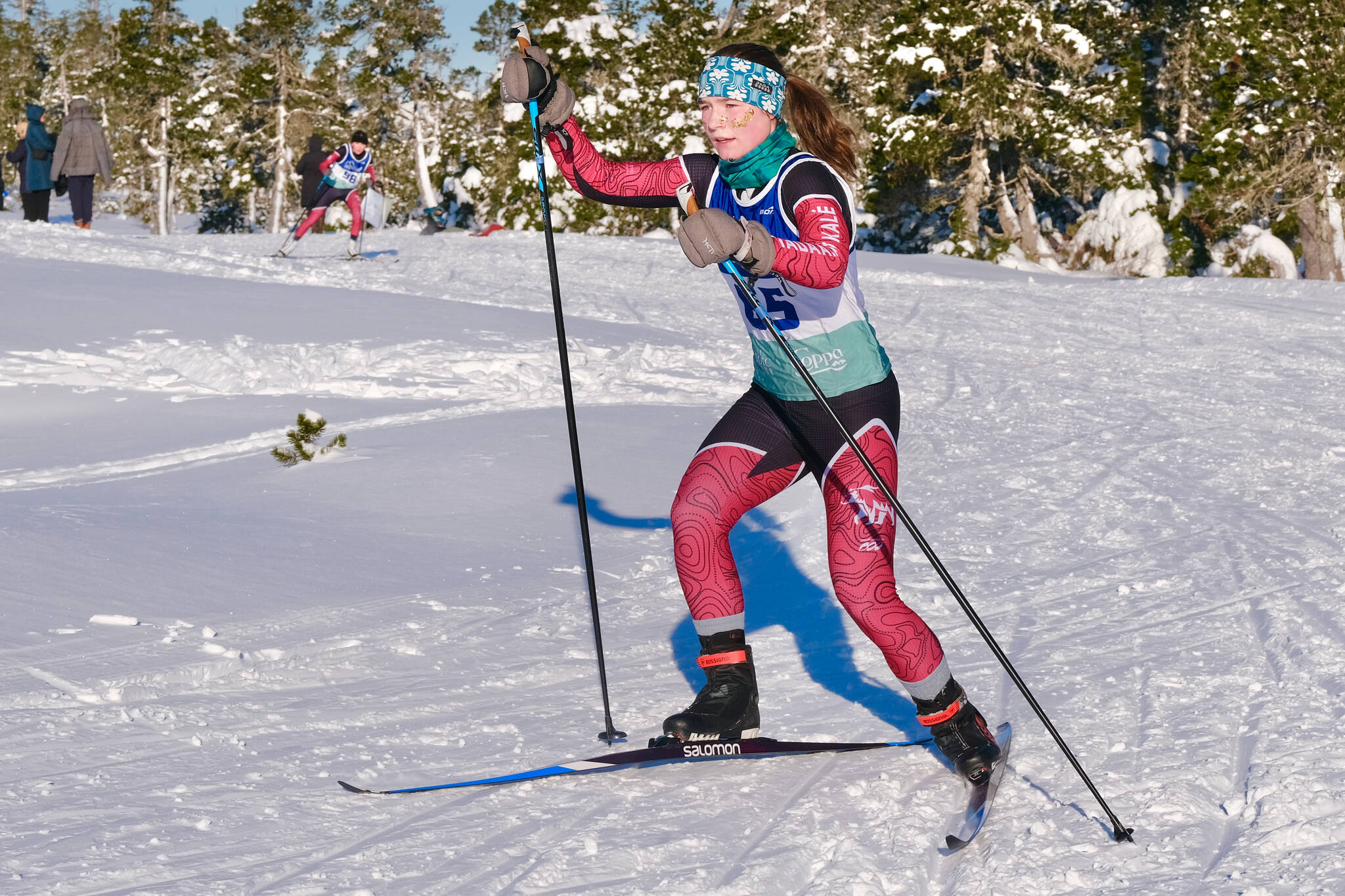 Juneau-Douglas High School: Yadaa.at Kalé Nordic Ski Team junior Della Mearig (65) races during the Shaky Shakeout Invitational six-kilometer freestyle mass start Saturday at Eaglecrest Ski Area. (Klas Stolpe / Juneau Empire)