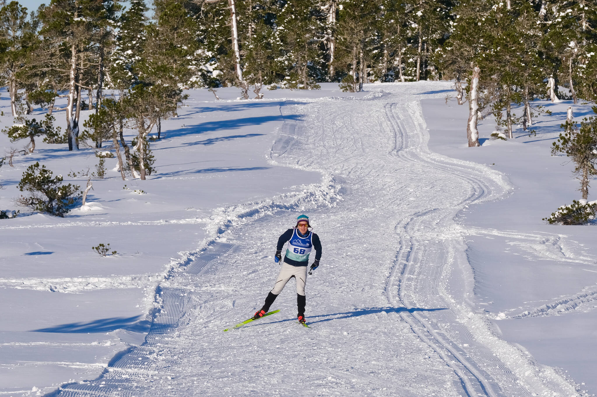 Community Nordic skier Julius Adolfsson (68) heads to the finish of the Shaky Shakeout Invitational six-kilometer freestyle mass start race Saturday at Eaglecrest Ski Area. (Klas Stolpe / Juneau Empire)