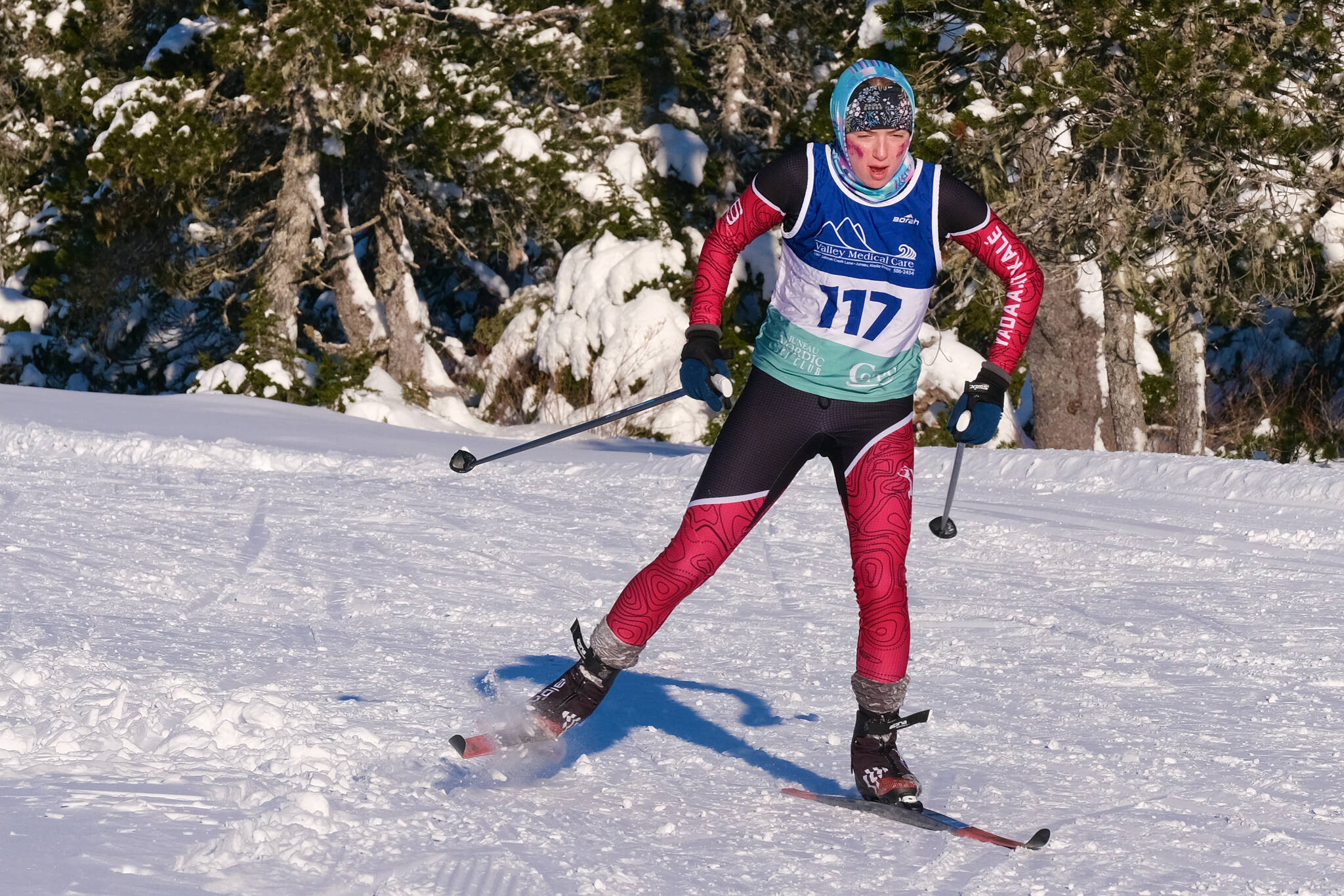 Juneau-Douglas High School: Yadaa.at Kalé Nordic Ski Team junior Siena Farr (117) races during the Shaky Shakeout Invitational six-kilometer freestyle mass start race Saturday at Eaglecrest Ski Area. (Klas Stolpe / Juneau Empire)