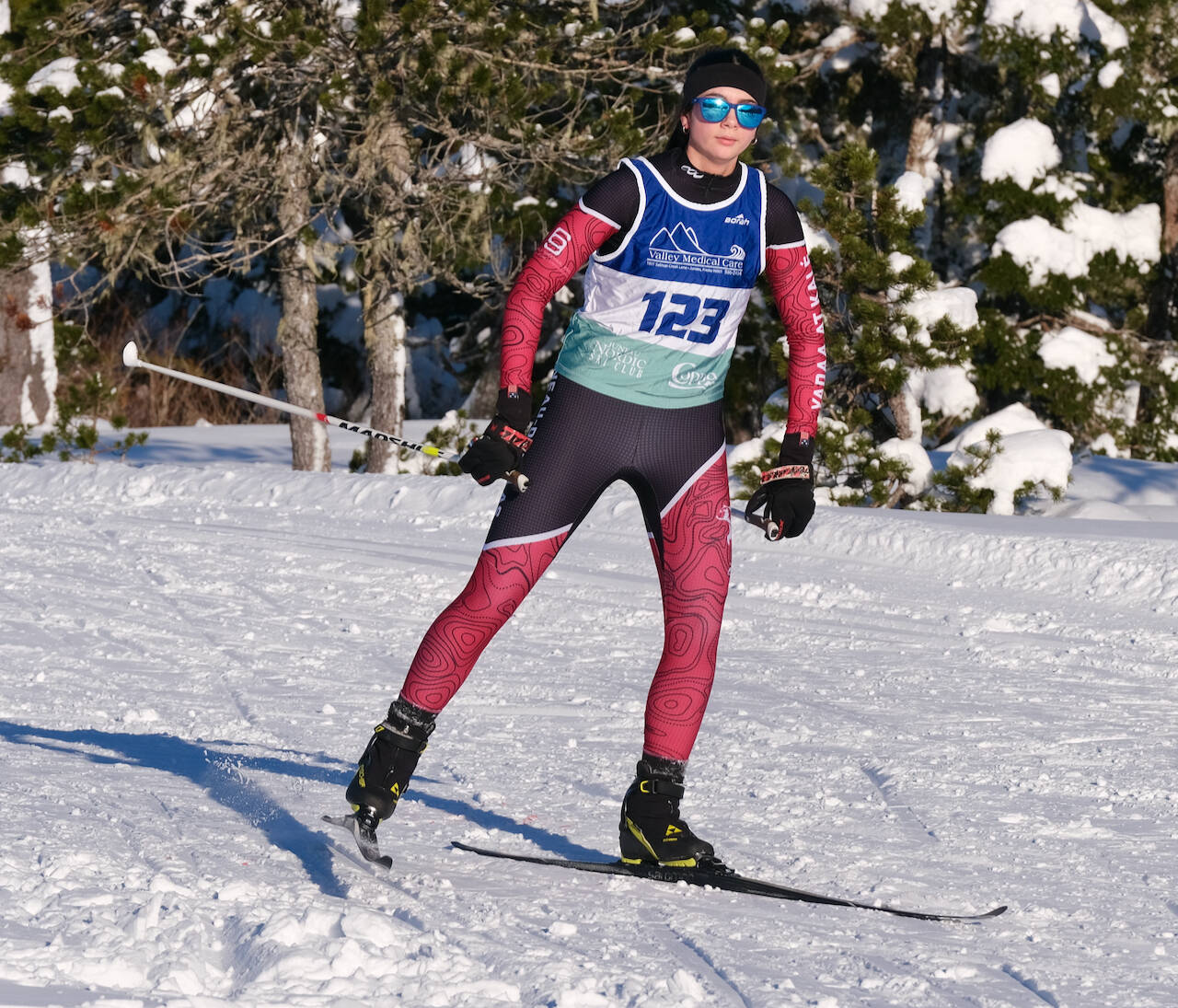 Juneau-Douglas High School: Yadaa.at Kalé Nordic Ski Team freshman Gracie Snyder (123) races during the Shaky Shakeout Invitational six-kilometer freestyle mass start Saturday at Eaglecrest Ski Area. (Klas Stolpe / Juneau Empire)