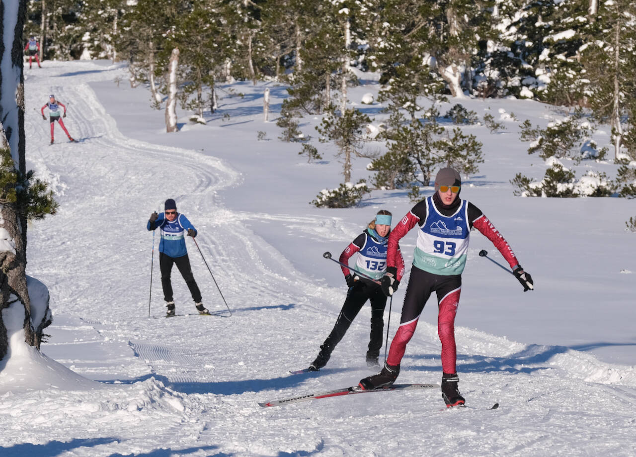 Juneau-Douglas High School: Yadaa.at Kalé Nordic Ski Team and community skiers approach the finish of the Shaky Shakeout Invitational six-kilometer freestyle mass start Saturday at Eaglecrest Ski Area. (Klas Stolpe / Juneau Empire)