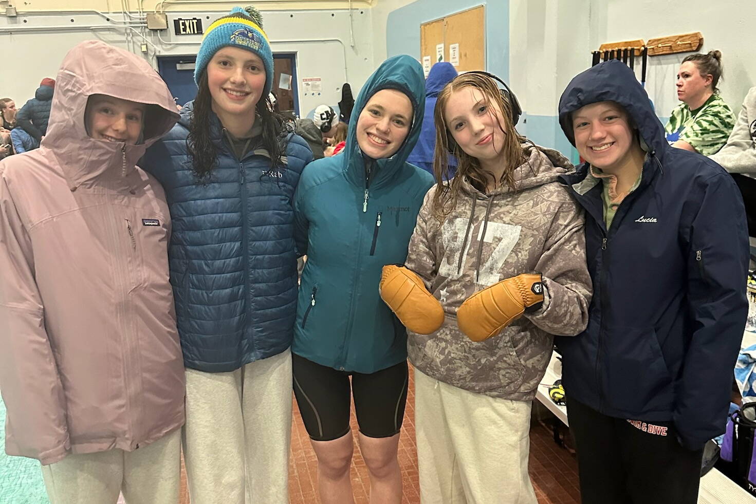 Glacier Swim Club athletes Valerie Peimann, Emma Fellman, Pacific Ricke, Lily Francis and Lucia Chapell dress for the cool pool weather at the 2025 Alaska Senior Championships in Soldotna last weekend. (Photo courtesy GSC)