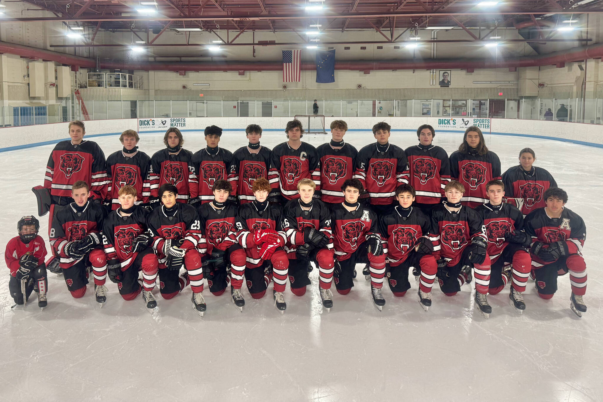 The Juneau-Douglas High School: Yadaa.at Kalé Crimson Bears hockey team are shown at the 2025 ASAA Division II Hockey State Championships in Soldotna. (Photo courtesy JDHS hockey)