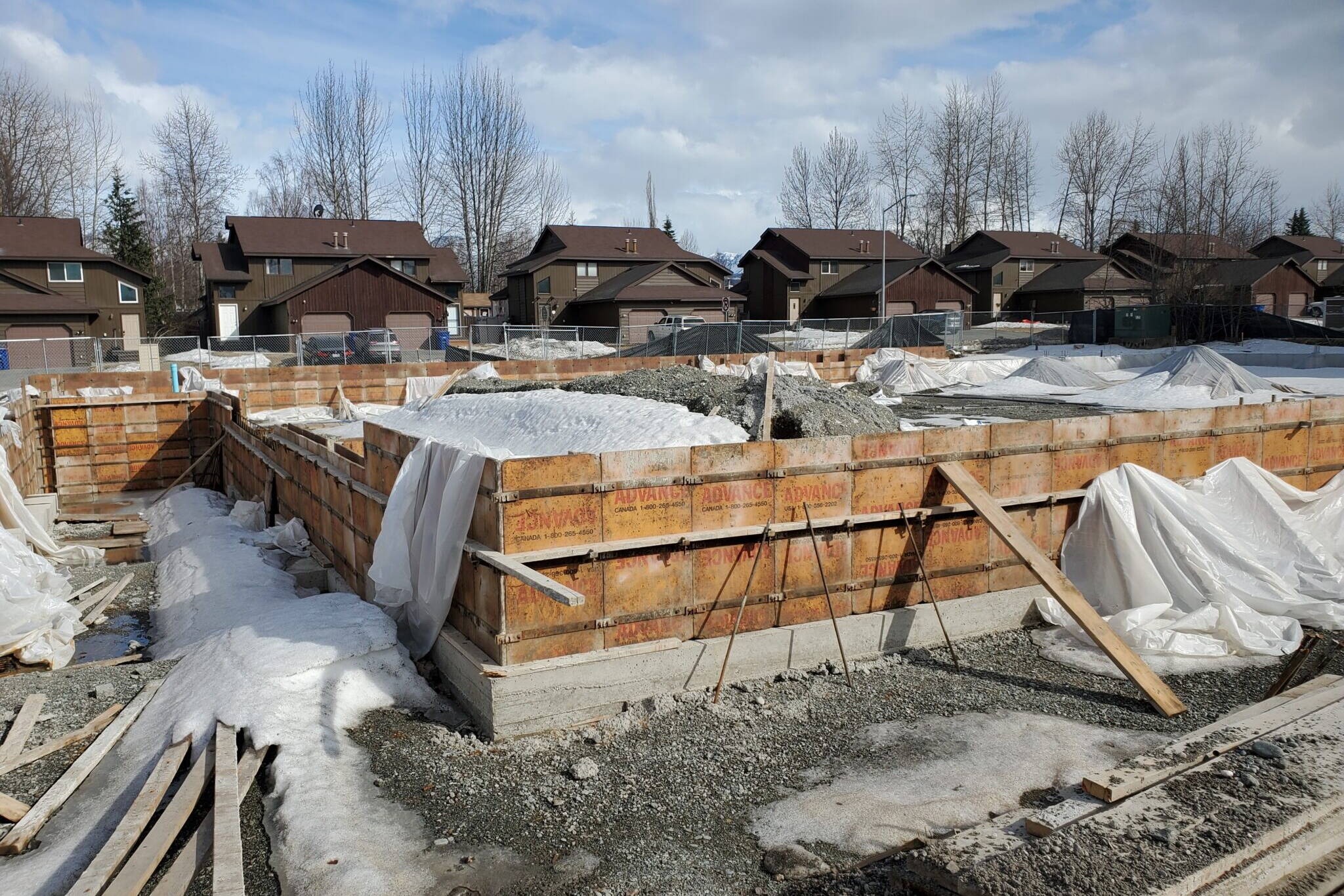 Construction progress on a new Kaladi Brothers warehouse in Midtown Anchorage is seen on April 22, 2024. Of all major Alaska economic sectors, construction had the highest percentage increase in nonresident hire in 2023, state economists report. (Yereth Rosen/Alaska Beacon)