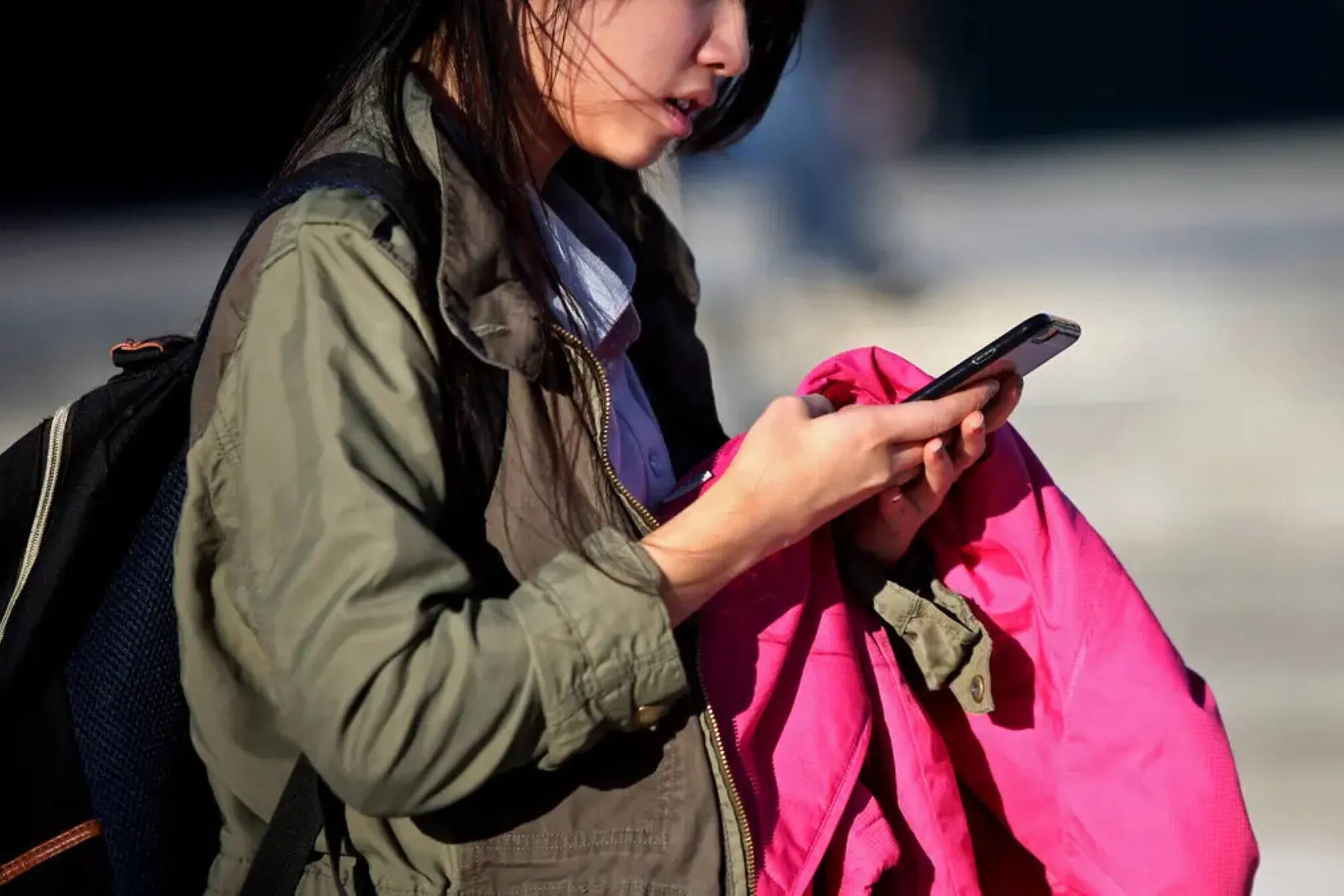 A girl uses her cellphone at Bronx High School of Science in New York on Jan. 11, 2016. (Yana Paskova for The New York Times)