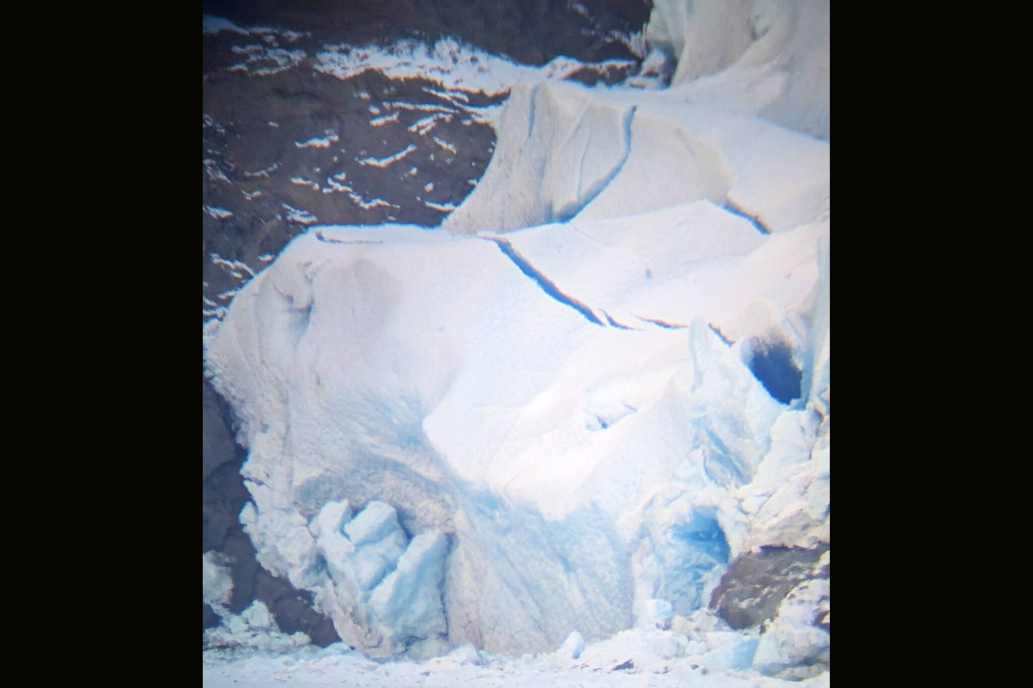 Large cracks in the Mendenhall Glacier are observed by U.S. Forest Service officials on the morning of Tuesday, Feb. 11, 2025. (U.S. Forest Service photo)