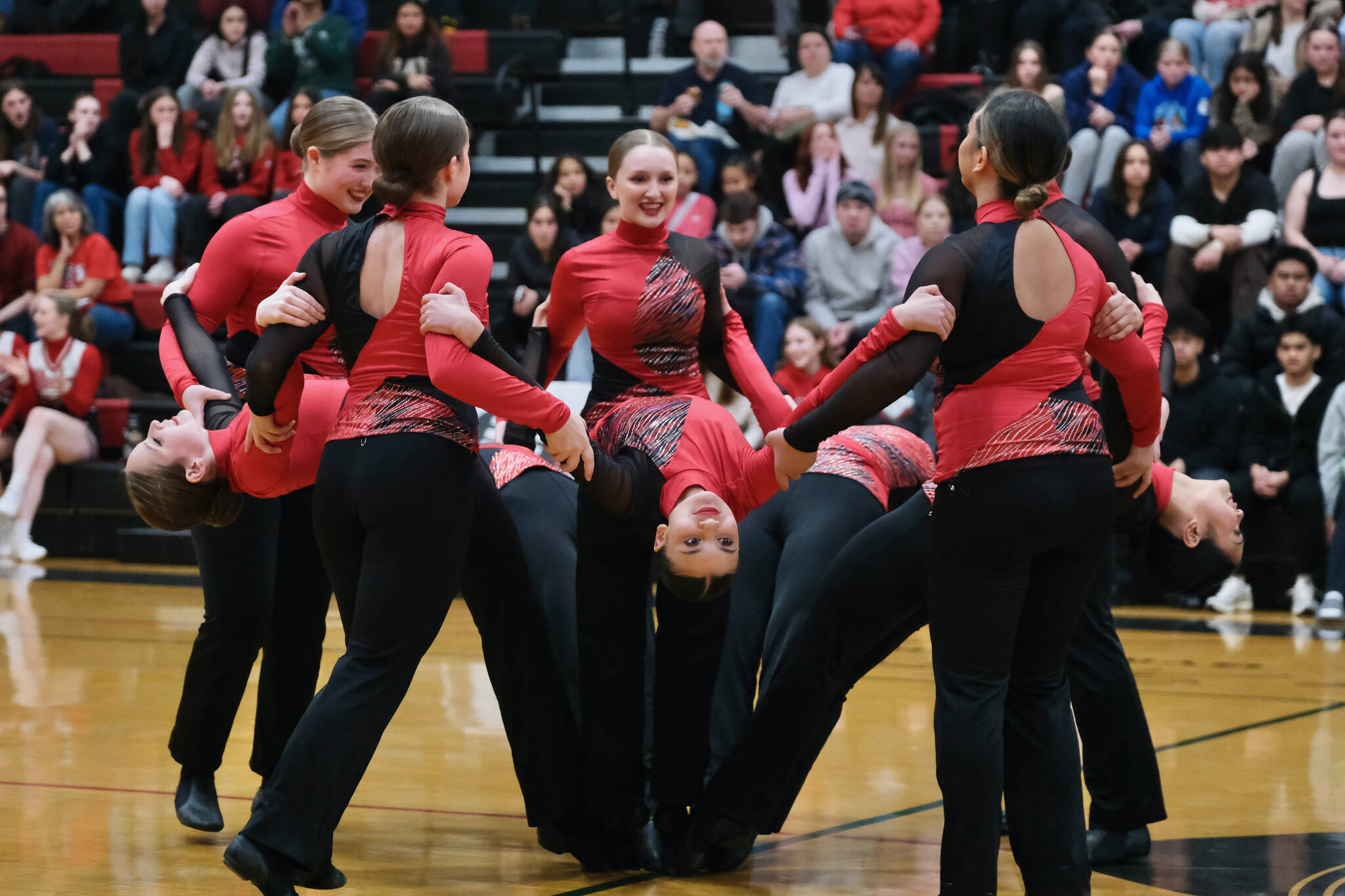 Members of the Juneau-Douglas High School: Yadaa.at Kalé dance team perform in their Military March routine during last weekend’s home games against Wasilla. The dance team will perform Thursday and Friday during the Crimson Bears home games against the Kayhi Lady Kings. (Klas Stolpe / Juneau Empire)