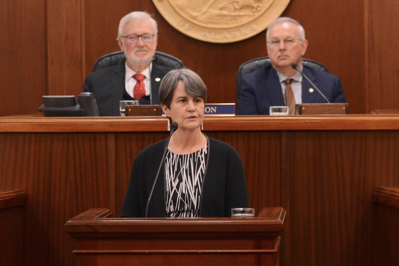 Alaska Chief Justice Susan Carney speaks to the Alaska Legislature on Wednesday, Feb. 12, 2025. At background are Senate President Gary Stevens, R-Kodiak (left) and Speaker of the House Bryce Edgmon, I-Dillingham (right). (James Brooks/Alaska Beacon)