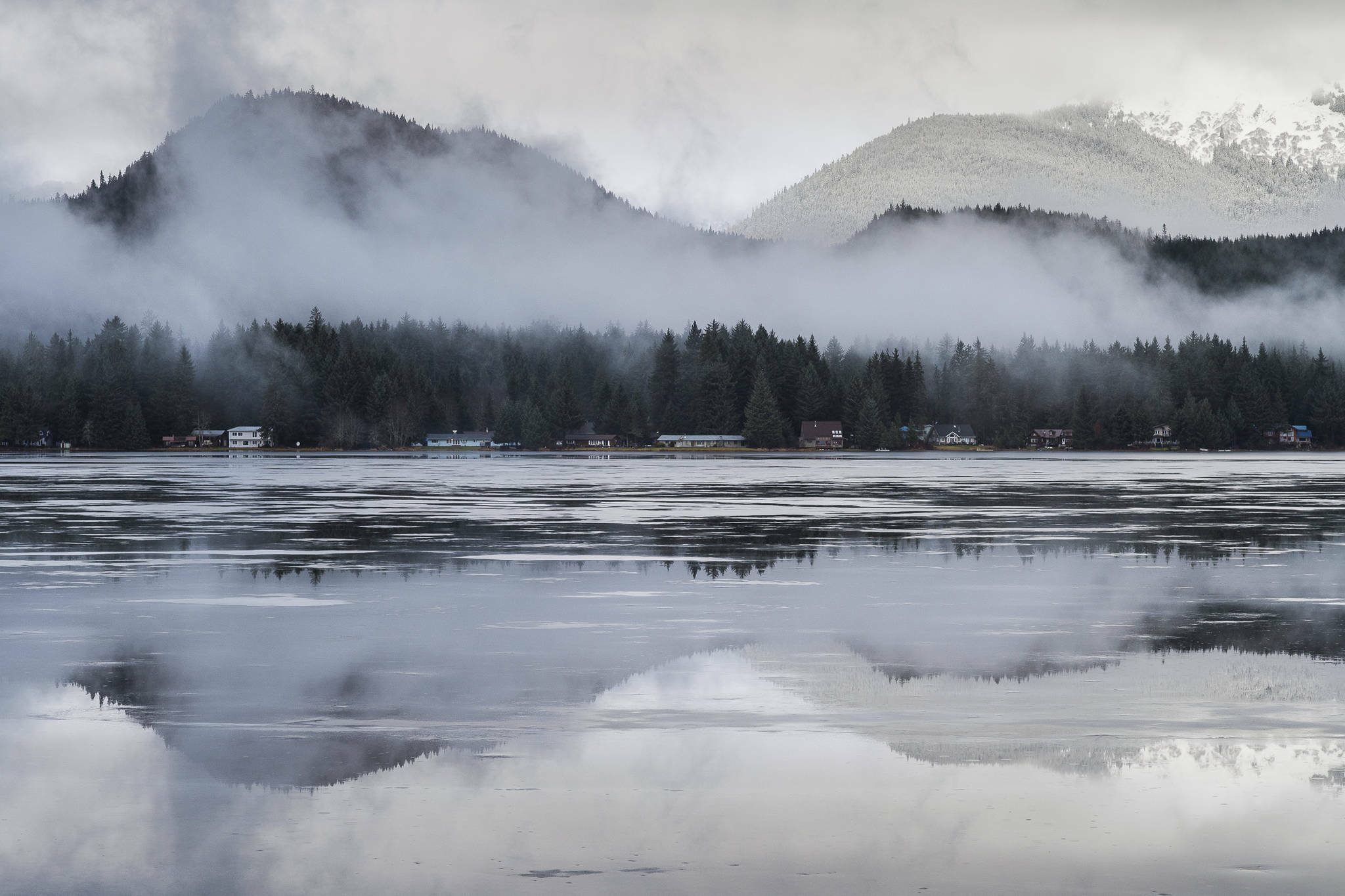 Fresh rainwater sits on top of the ice at Auke Lake. (Michael Penn / Juneau Empire file photo)