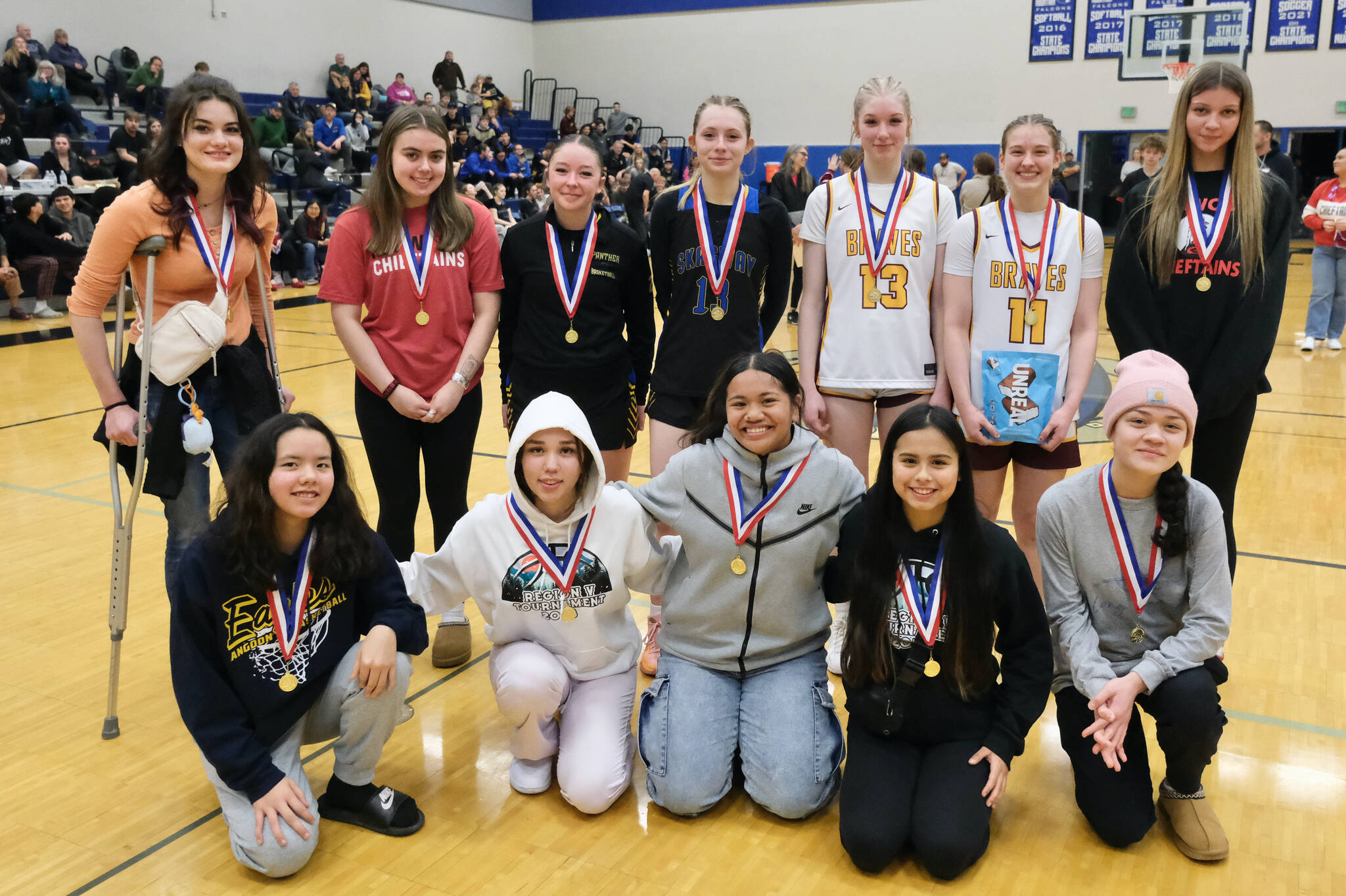 The 1A Girls All-Conference team are back row left-to-right, Anna Congdon (TB), Lea Armour (KLWK), Kaitlyn Tronrud (SKG), Lennon Jennings (SKG), Paige Woitte (HNH), Easton Ross (HNH) and Kaiya Marvin (KLWK). Front row l-r are Aliana Nelson (ANG), Lisa Kookesh-Booth (ANG), Kia Robert (HYD), Keira Sanderson (KLWK) and Aurora Davis (Kake). (Klas Stolpe / Juneau Empire)