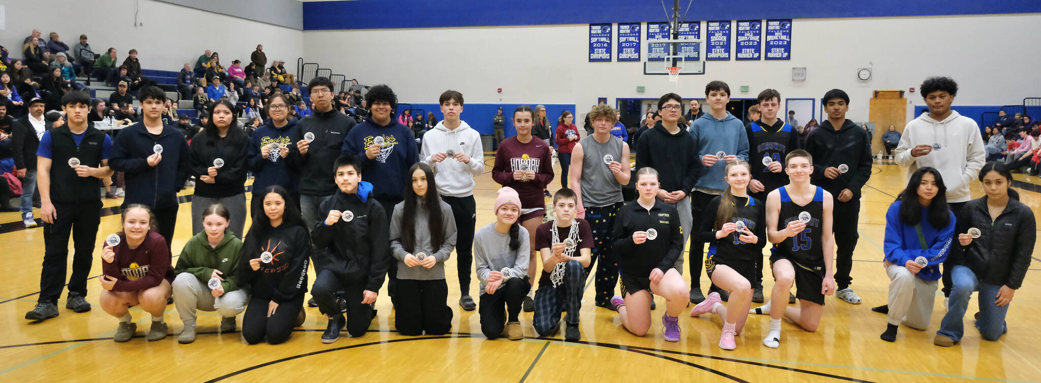 Members of the Good Sport Team are shown Saturday at the Region V 1A Basketball Tournament at Thunder Mountain Middle School. (Klas Stolpe / Juneau Empire)