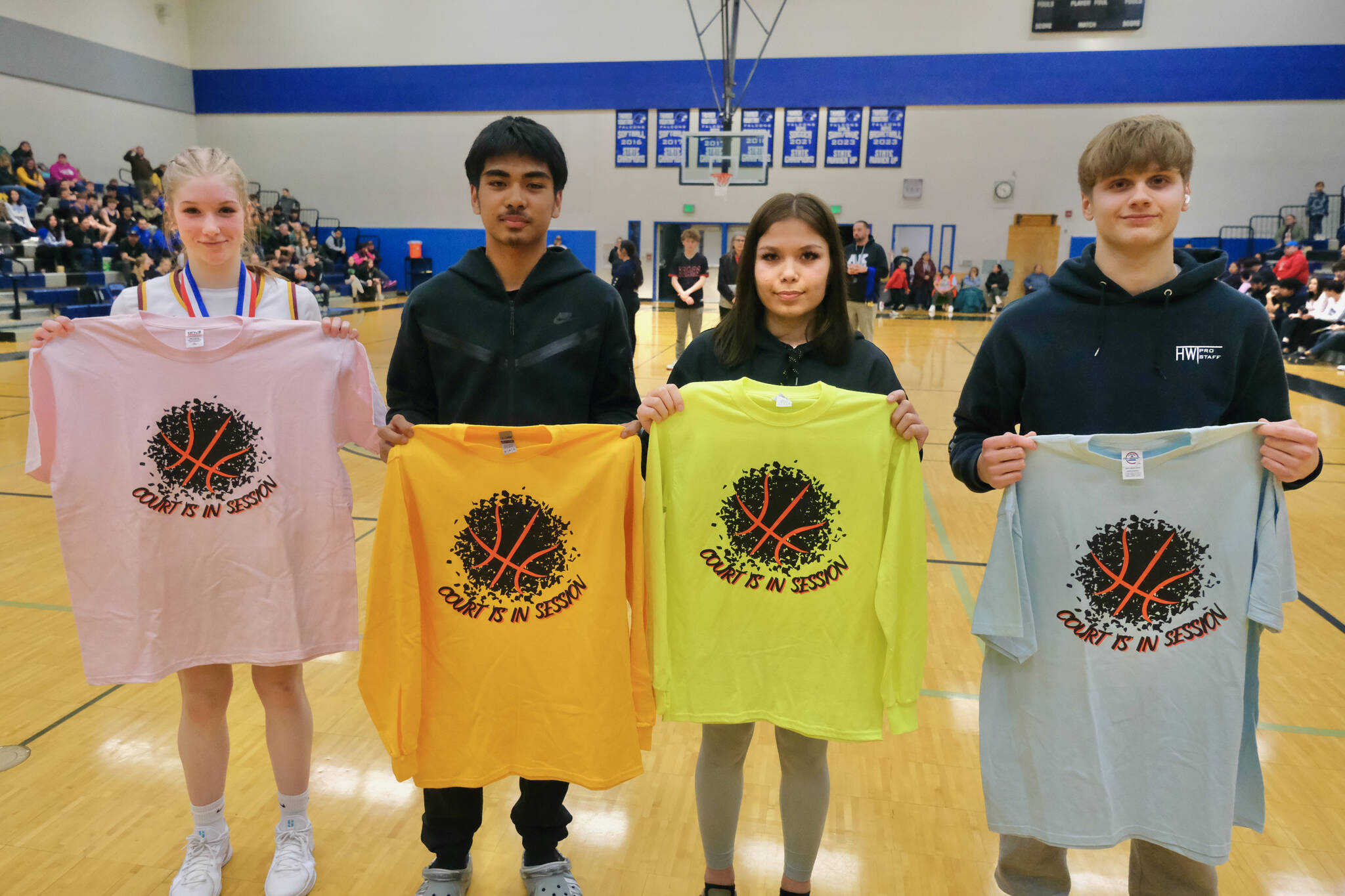 Three-Point champions Paige Woitte (HNH) and Alan Koneki (HYD) stand with Free Throw champions Macy Alander (HYD) and Tristin Ryno (KLWK). (Klas Stolpe / Juneau Empire).