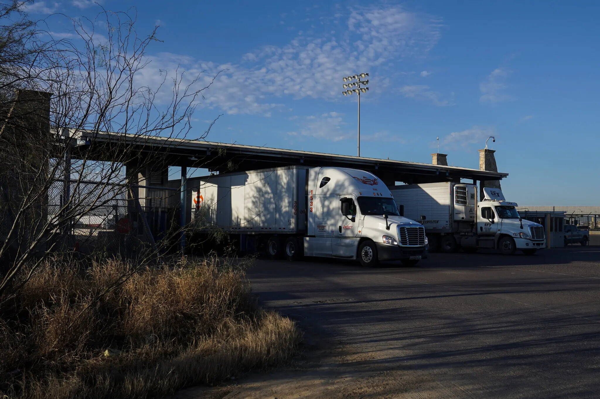 Trucks coming from Mexico at a border crossing in Laredo, Texas, in February. (Gabriel V. Cárdenas for The New York Times)