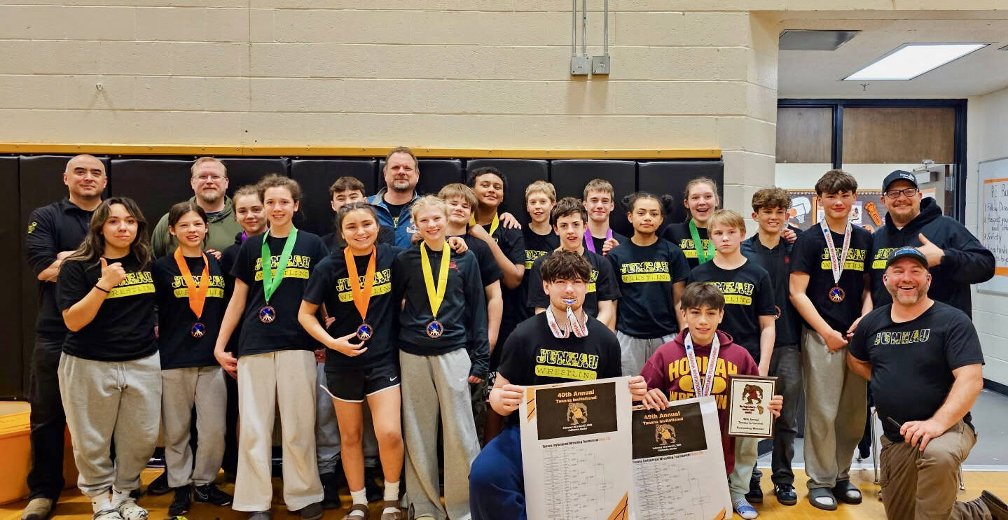 The Juneau Youth Wrestling Club middle school age grapplers pose at the Tanana Middle School Wrestling Invitational at Tanana on Saturday. (Photo courtesy JYWC)