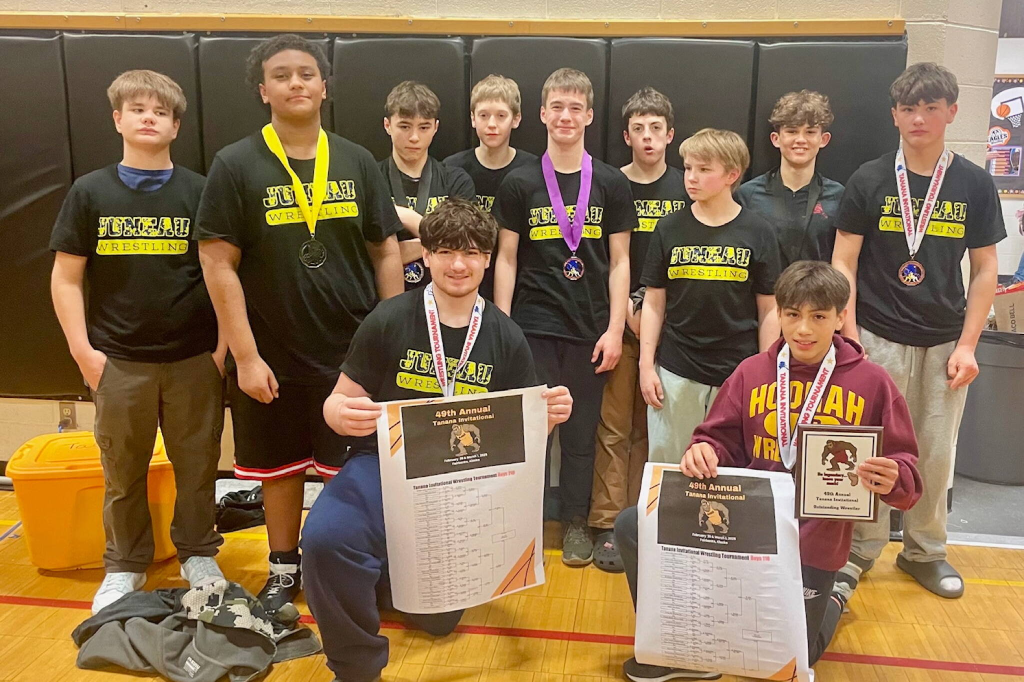 The Juneau Youth Wrestling Club boys division grapplers pose at the Tanana Middle School Wrestling Invitational at Tanana on Saturday. (Photo courtesy JYWC)