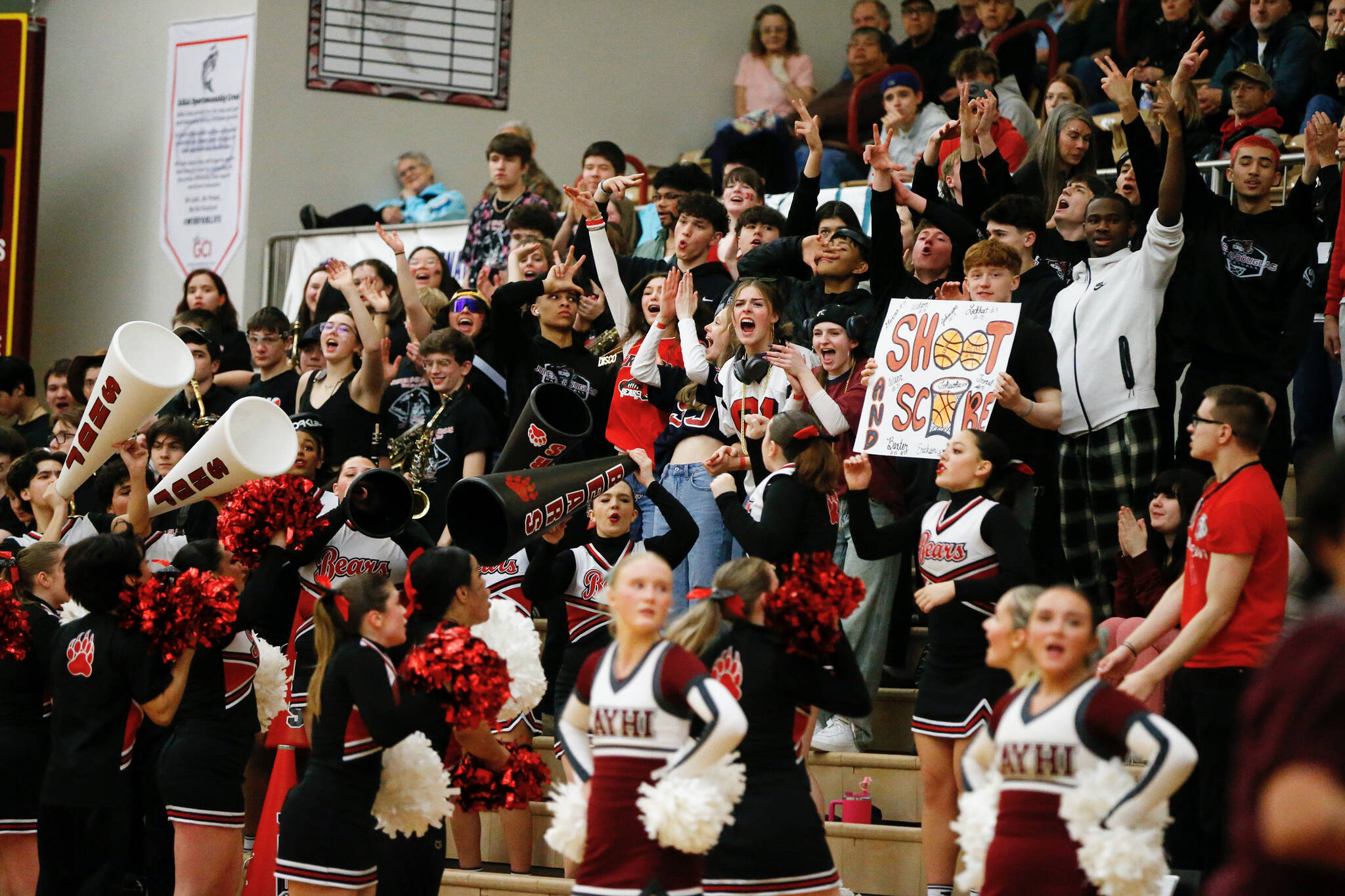 Juneau-Douglas High School: Yadaa.at Kalé fans cheer during JDHS’ 64-36 victory over Ketchikan on the first day of the Region V 4A Basketball Tournament at the Clarke Cochrane Gymnasium on Thursday. (Christopher Mullen / Ketchikan Daily News)