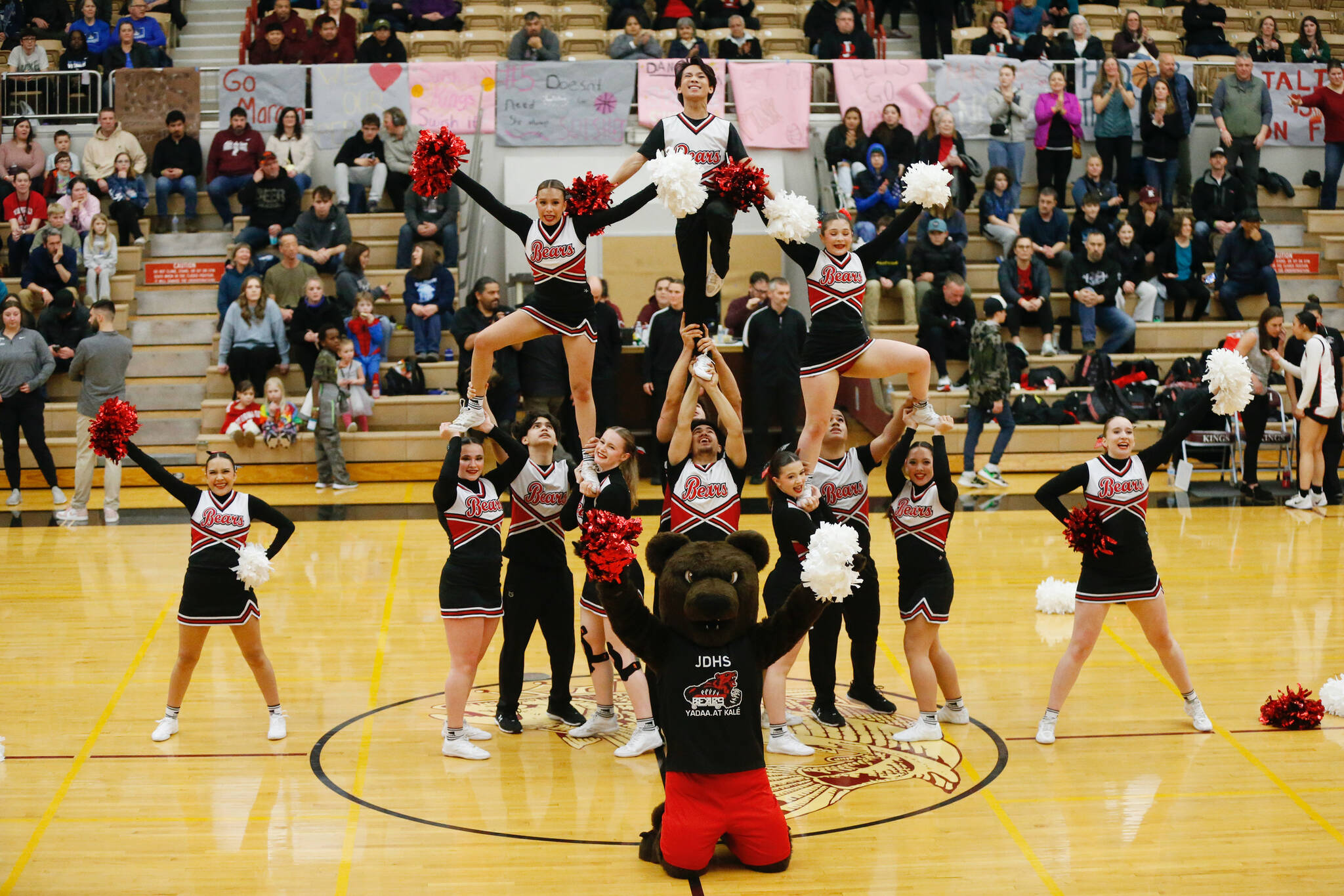 Juneau-Douglas High School: Yadaa.at Kalé cheerleaders perform during JDHS’ 64-36 victory over Ketchikan on the first day of the Region V 4A Basketball Tournament at the Clarke Cochrane Gymnasium on Thursday. (Christopher Mullen/ Ketchikan Daily News)