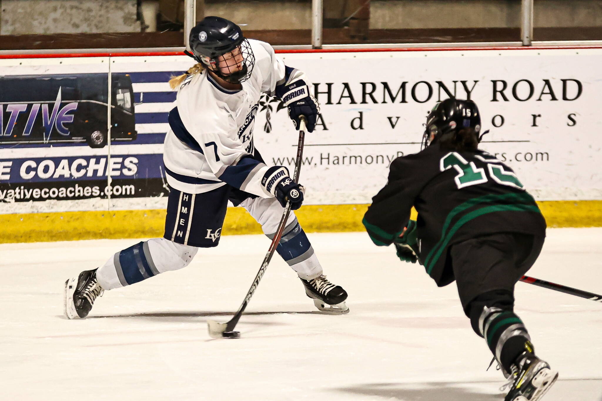 Lebanon Valley College sophomore forward Anna Dale (7) slaps a shot past a Stevenson University defender during Middle Atlantic Conference hockey action this year. (Photo courtesy Lebanon Valley College)