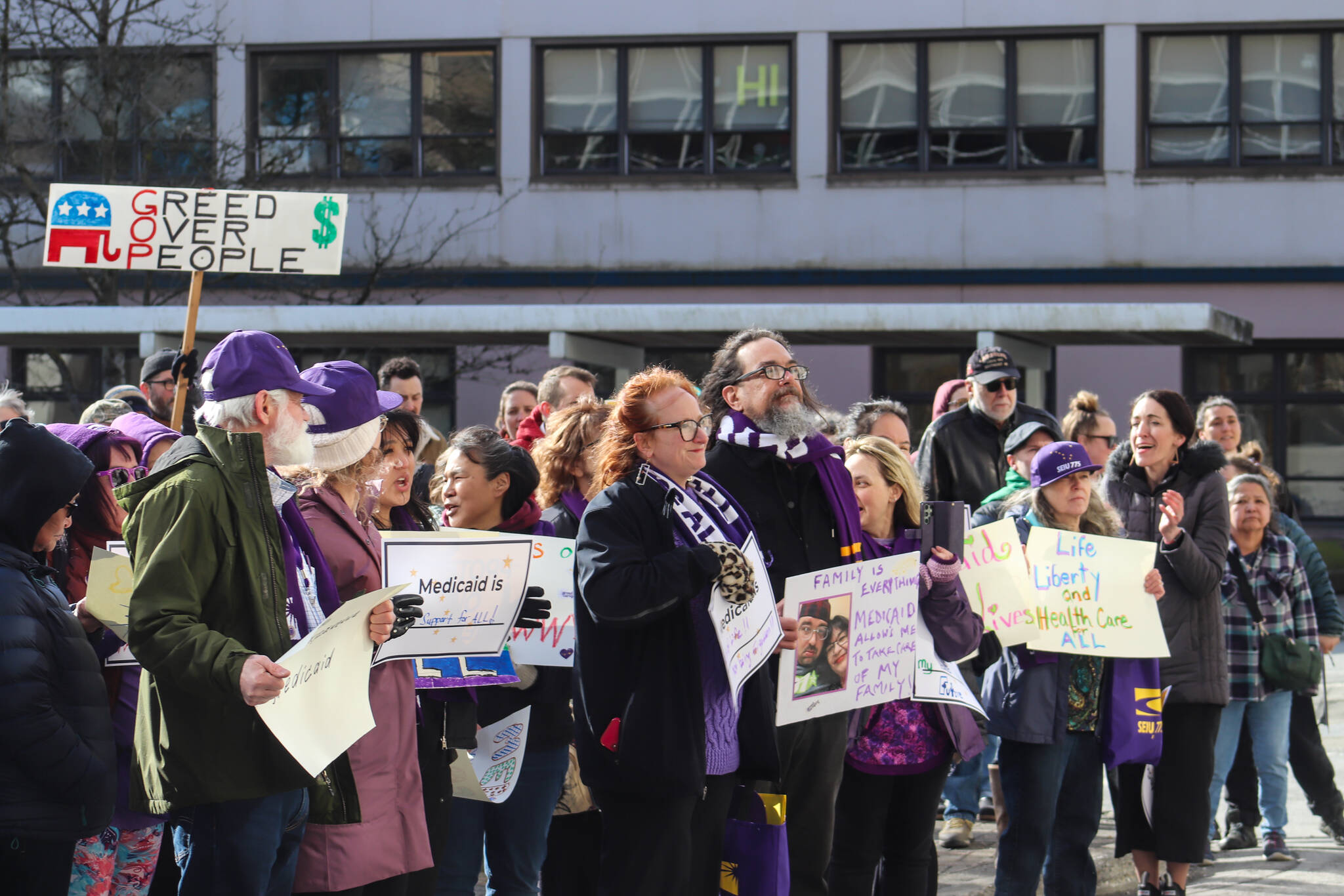 Protesters gather for a protest against Medicaid cuts at the Alaska State Capitol on Wednesday, March 12, 2025. (Jasz Garrett / Juneau Empire)